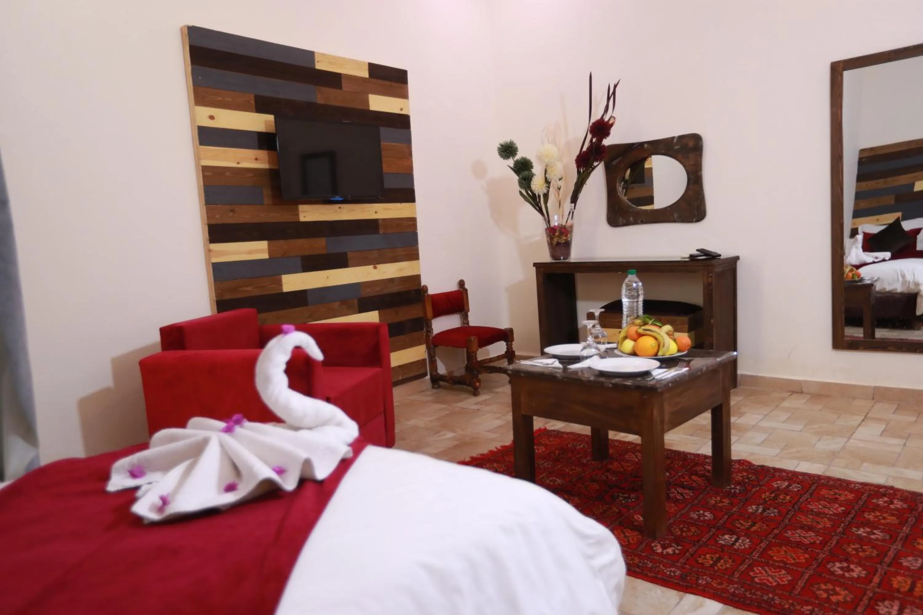 Seating area, Bed in Kasbah Tizimi