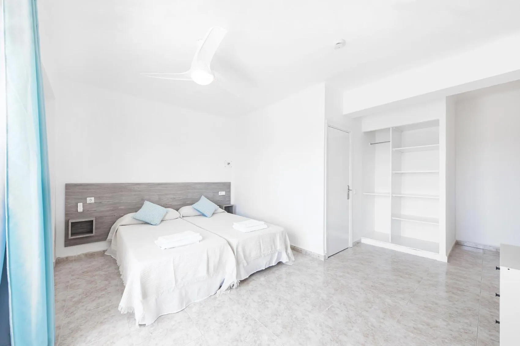 Bed in Hostal Cala Llombards