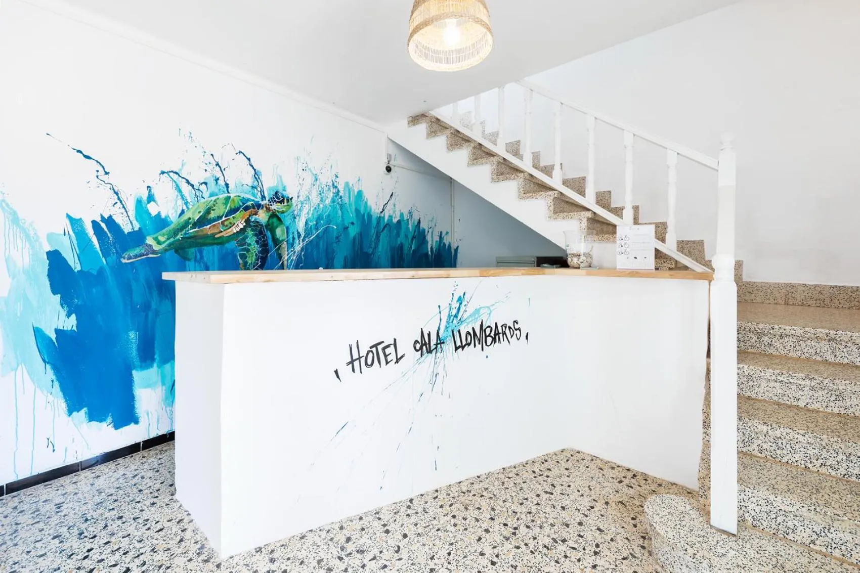 Lobby or reception in Hostal Cala Llombards