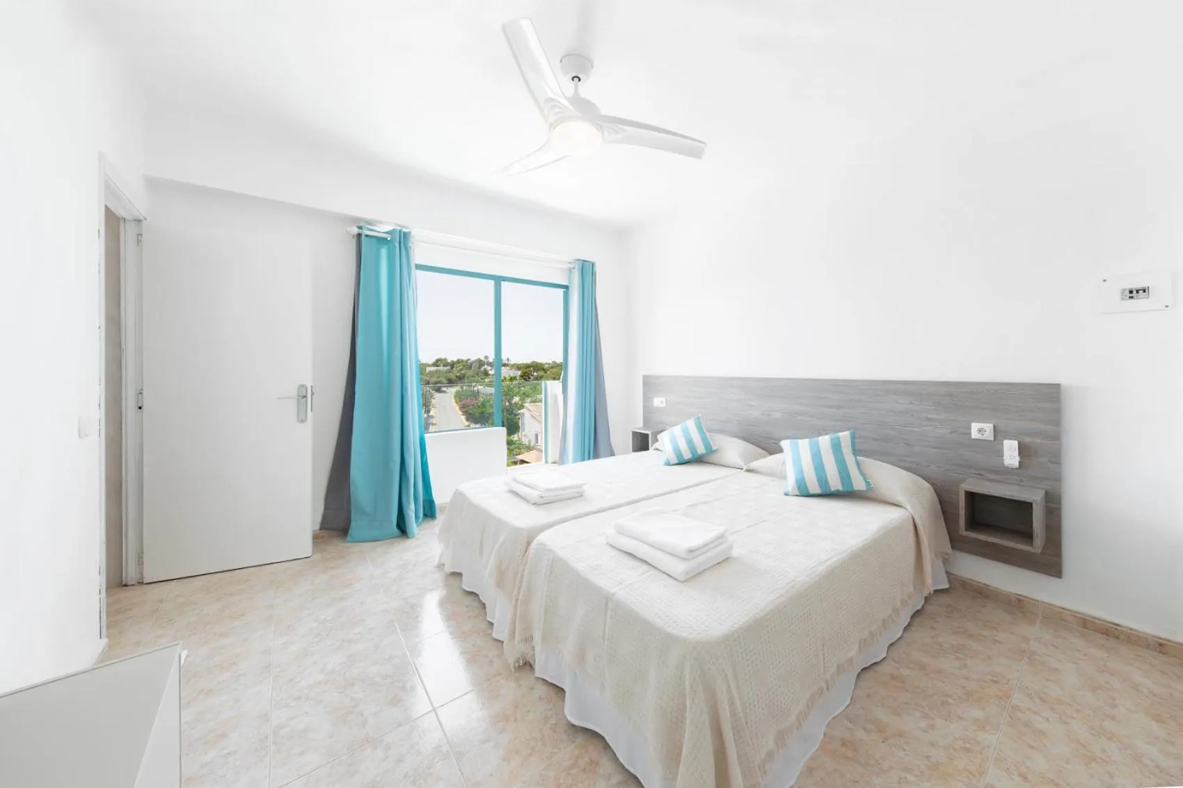 Bed in Hostal Cala Llombards