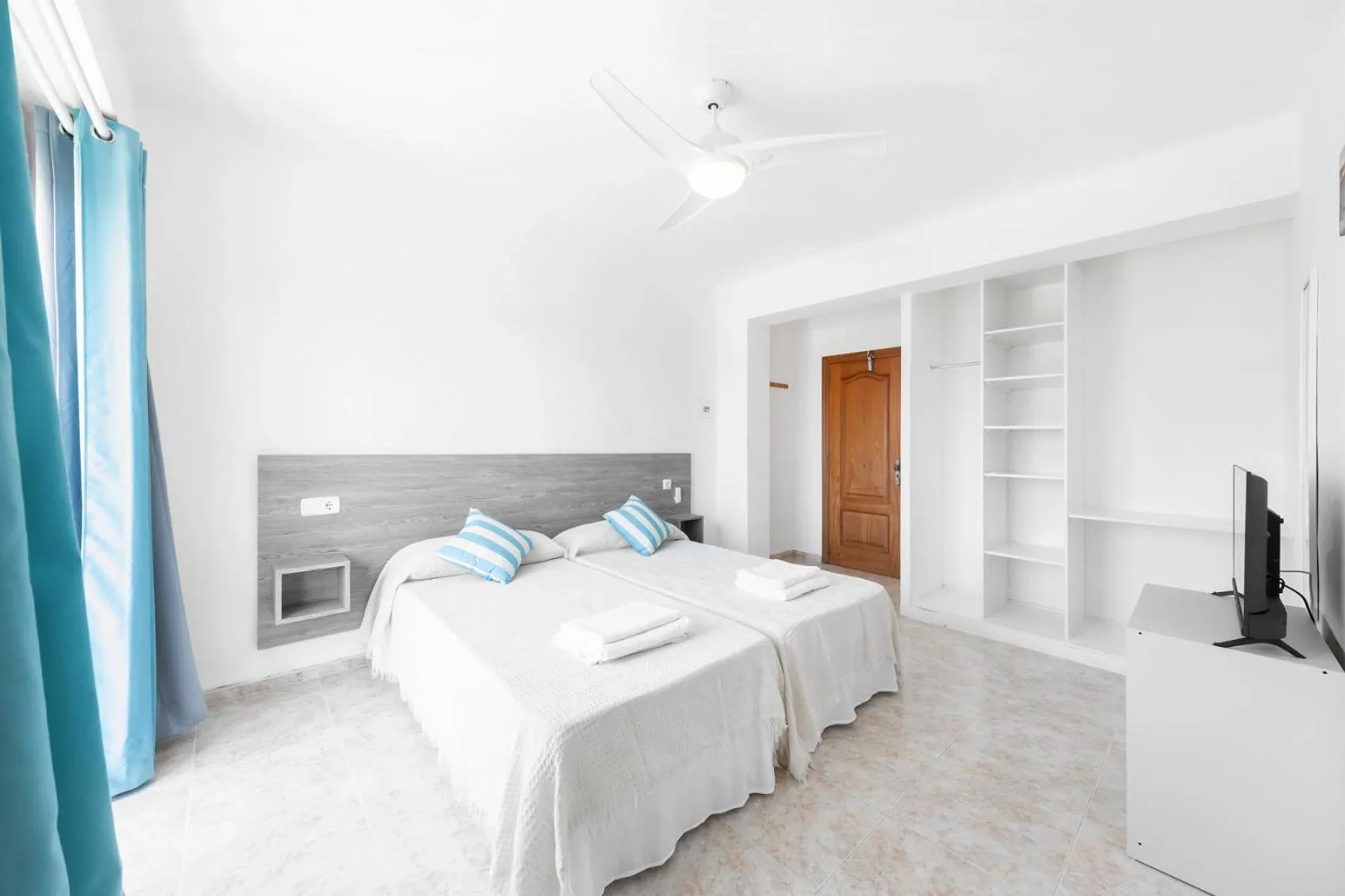 Bed in Hostal Cala Llombards