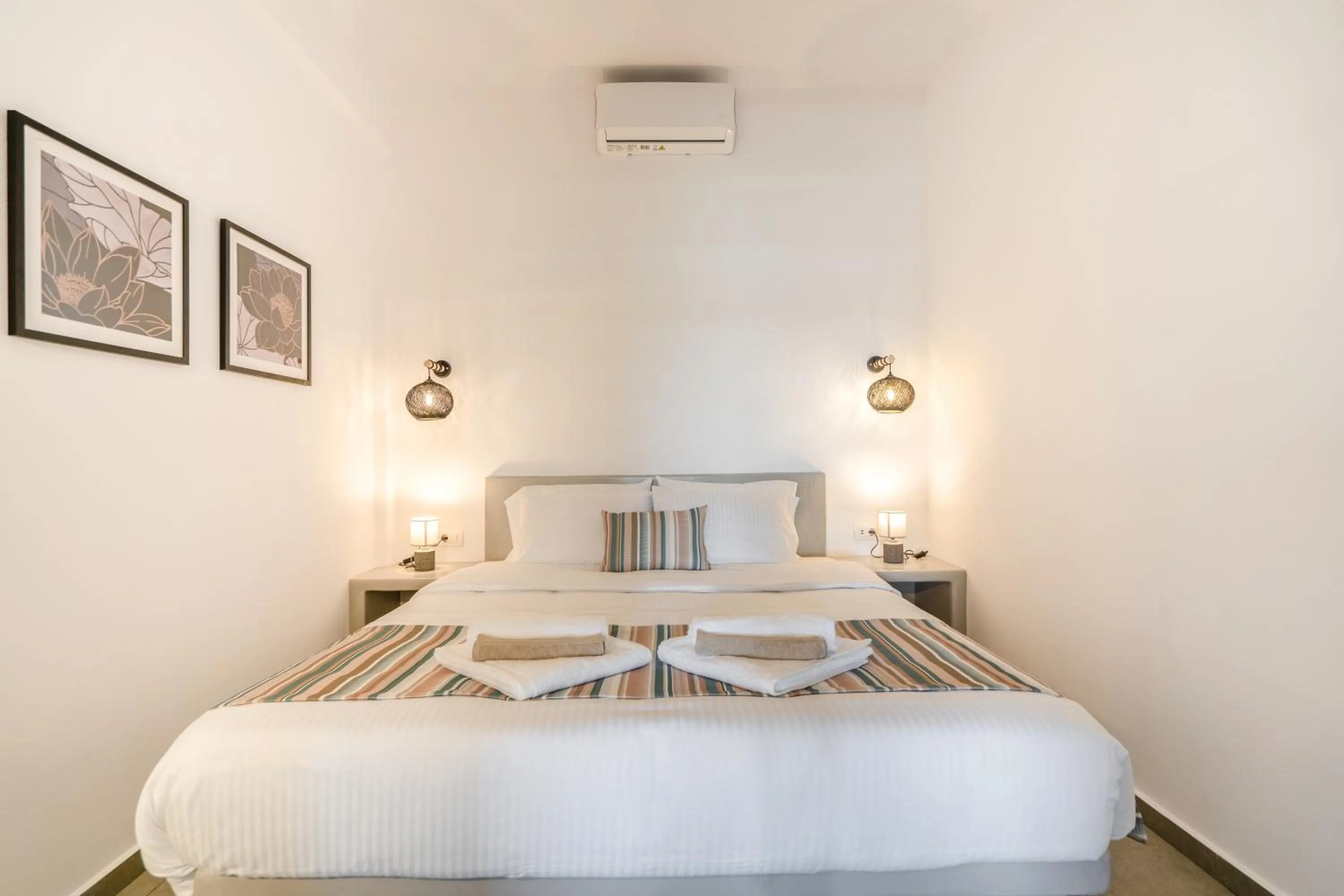 Bed in SN Santorini Apartments