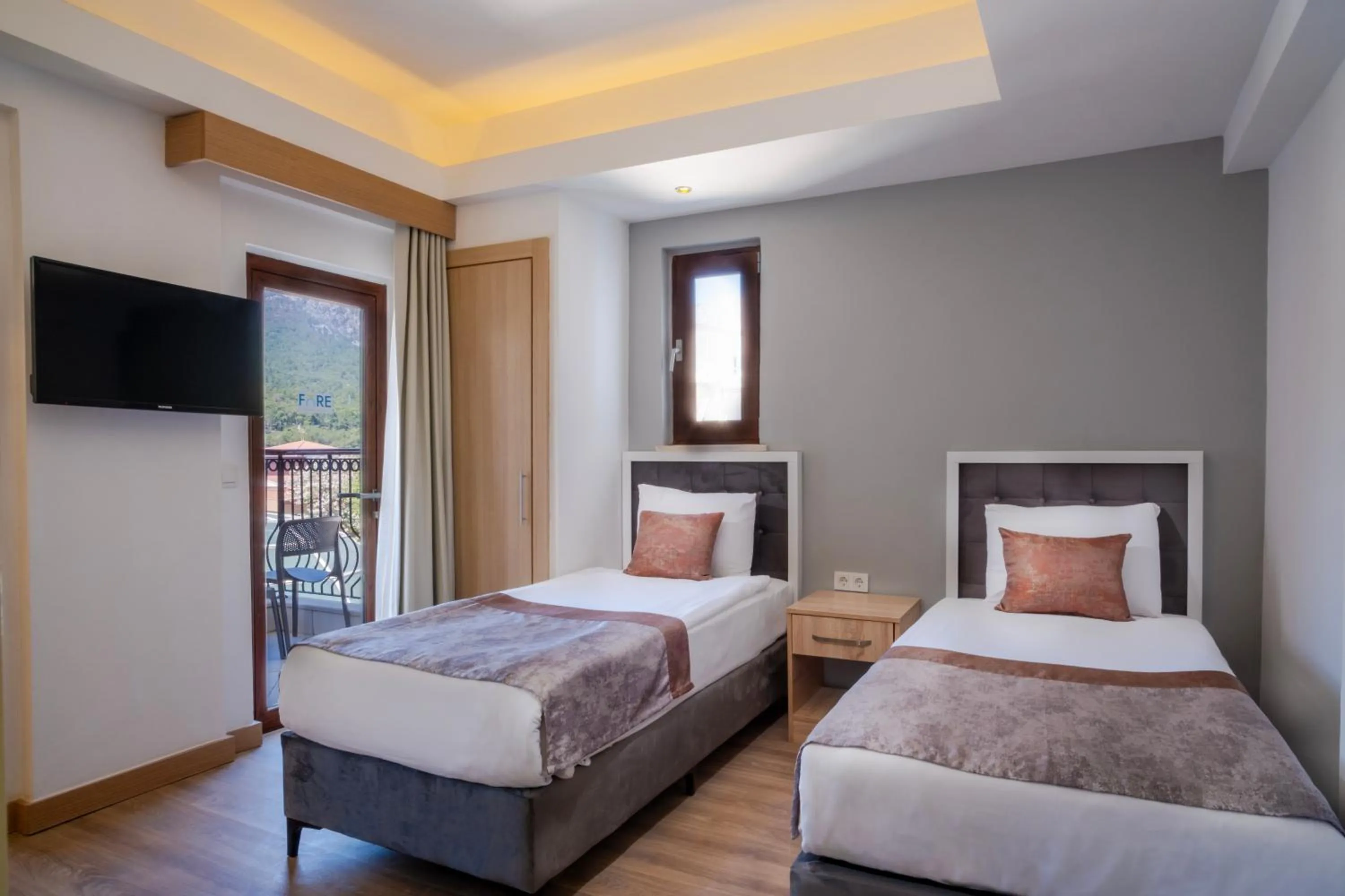 Bed in FORE RESORT & SPA