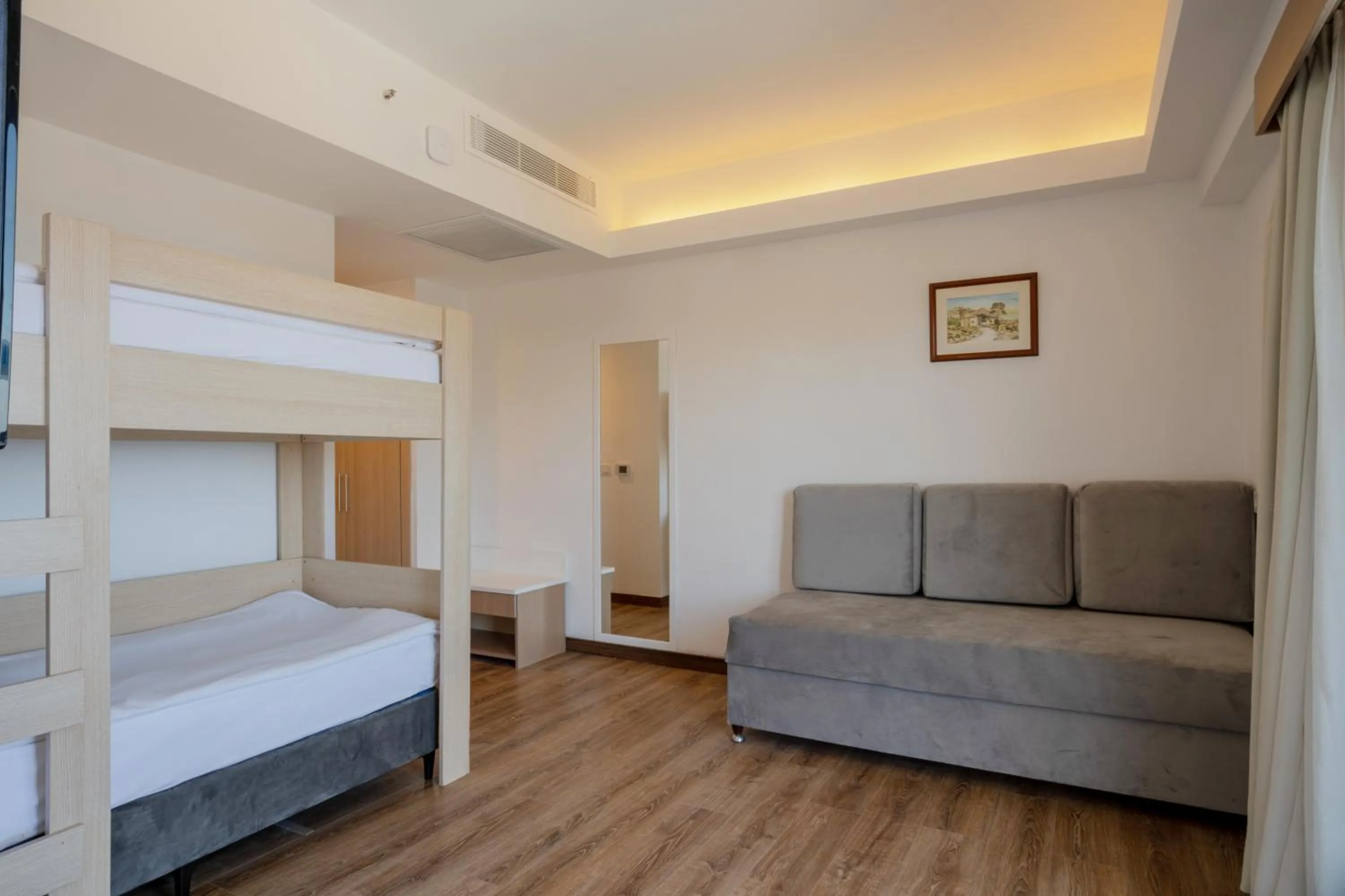 Bed in FORE RESORT & SPA