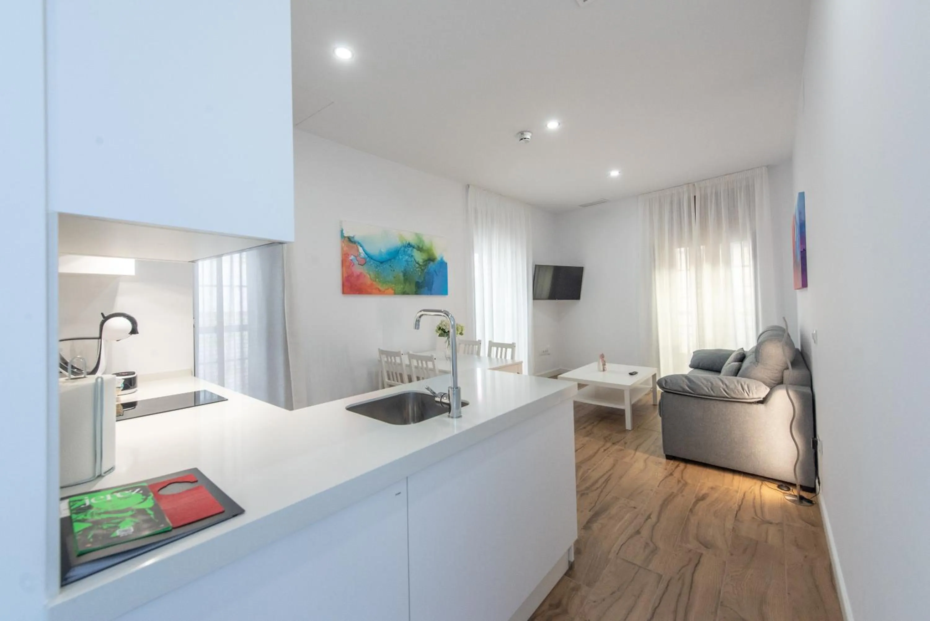 Kitchen or kitchenette, Bed in Apartamentos Santa María 15