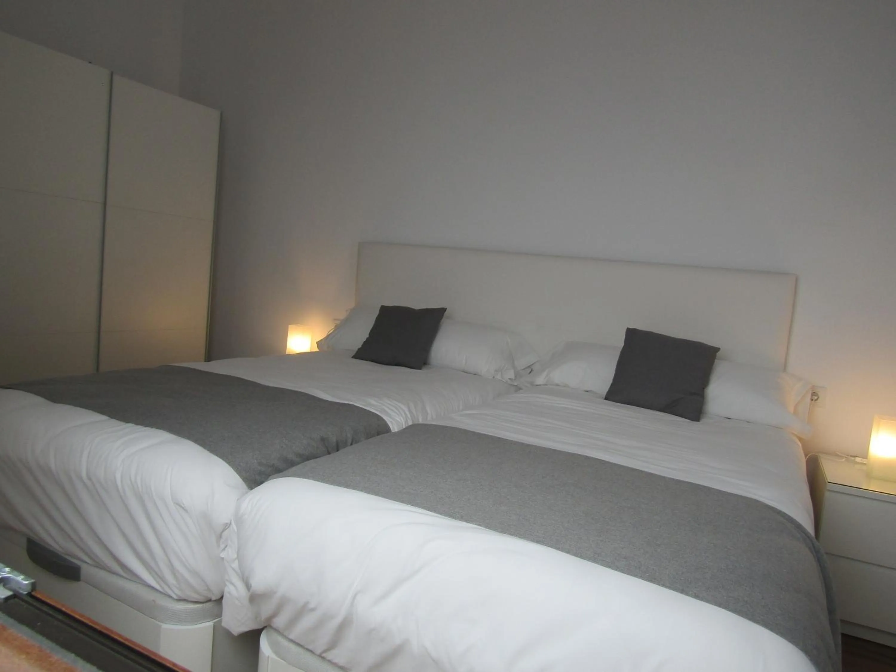 Bedroom, Bed in Apartamentos Santa María 15