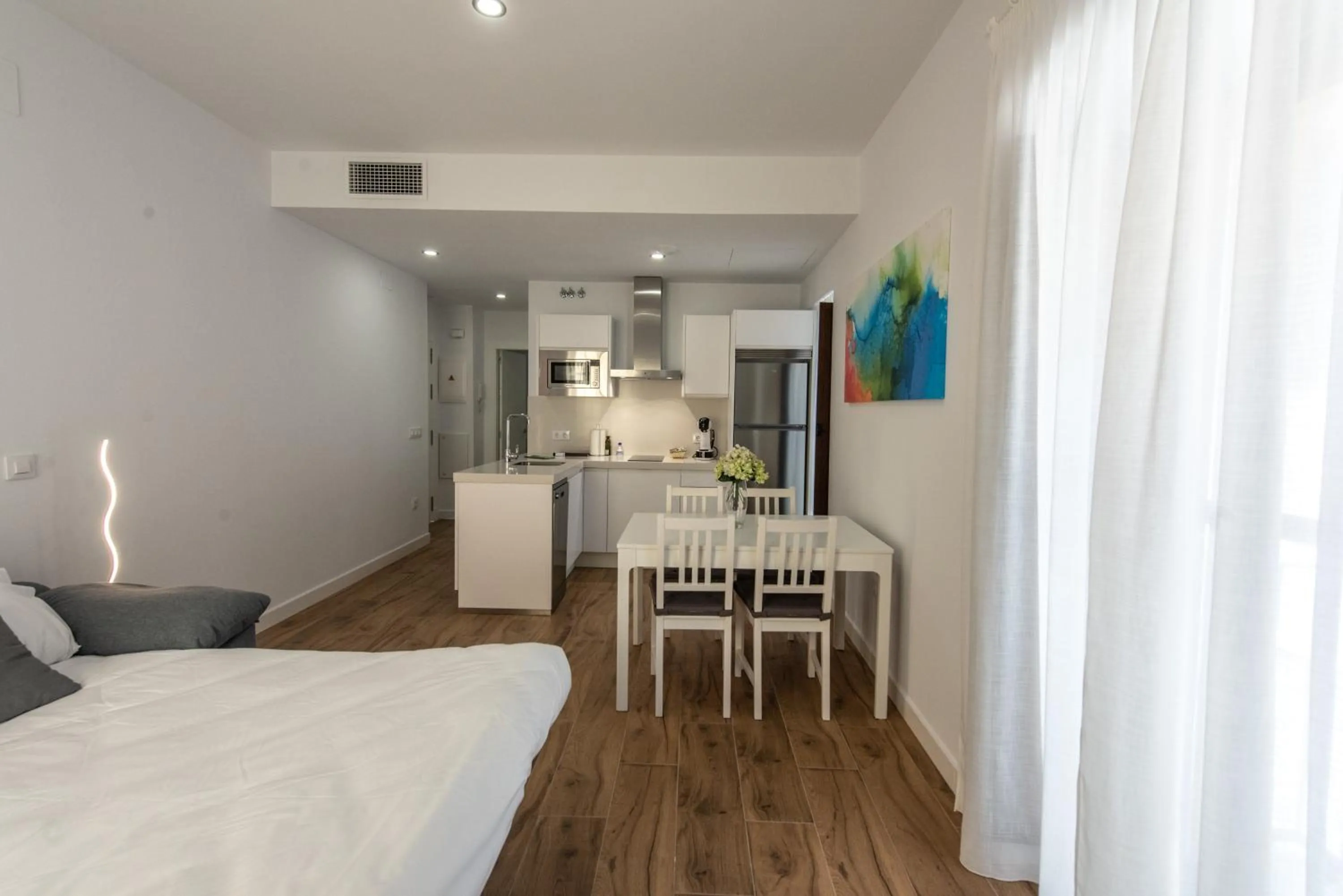 Living room, Bed in Apartamentos Santa María 15