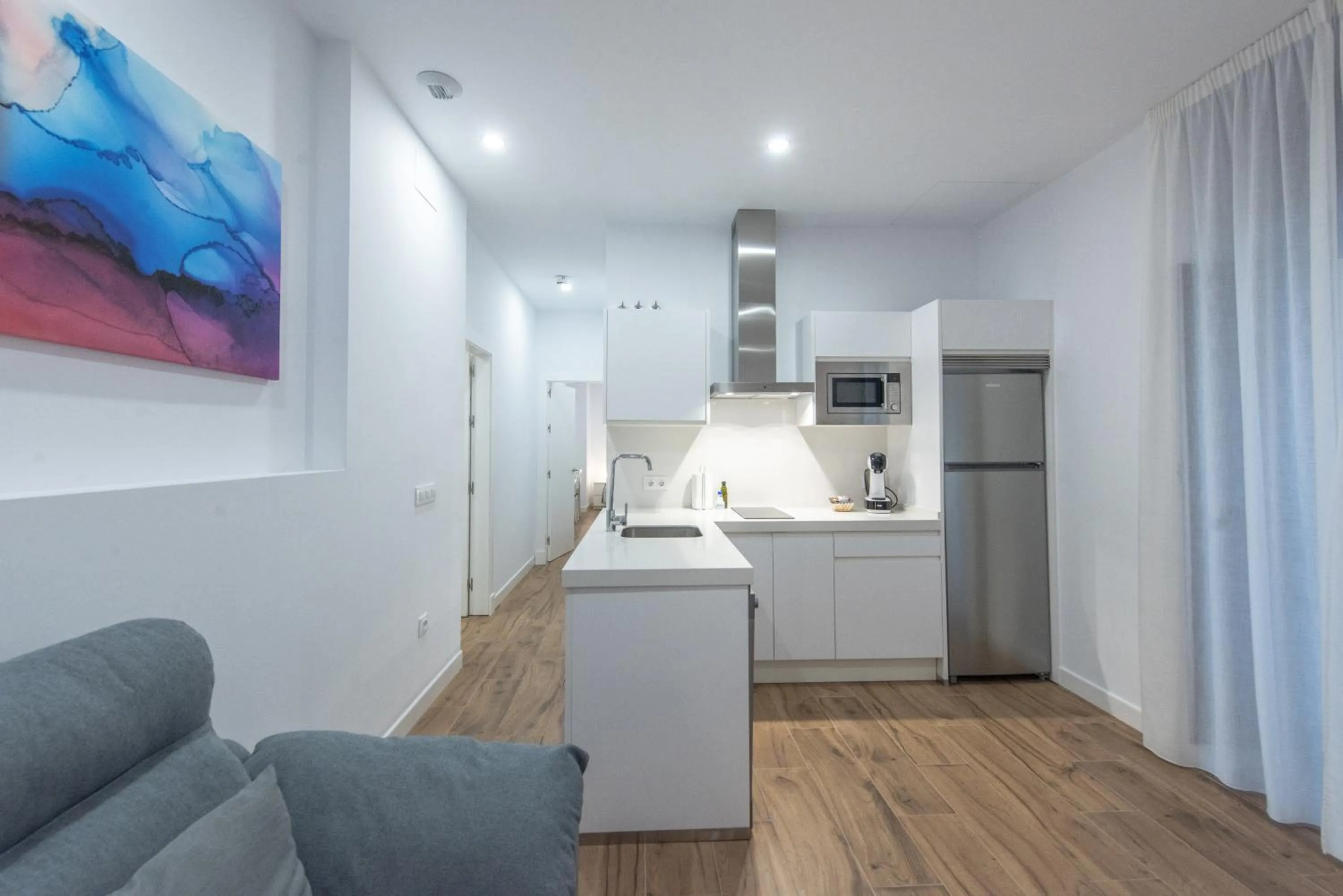 Kitchen or kitchenette in Apartamentos Santa María 15