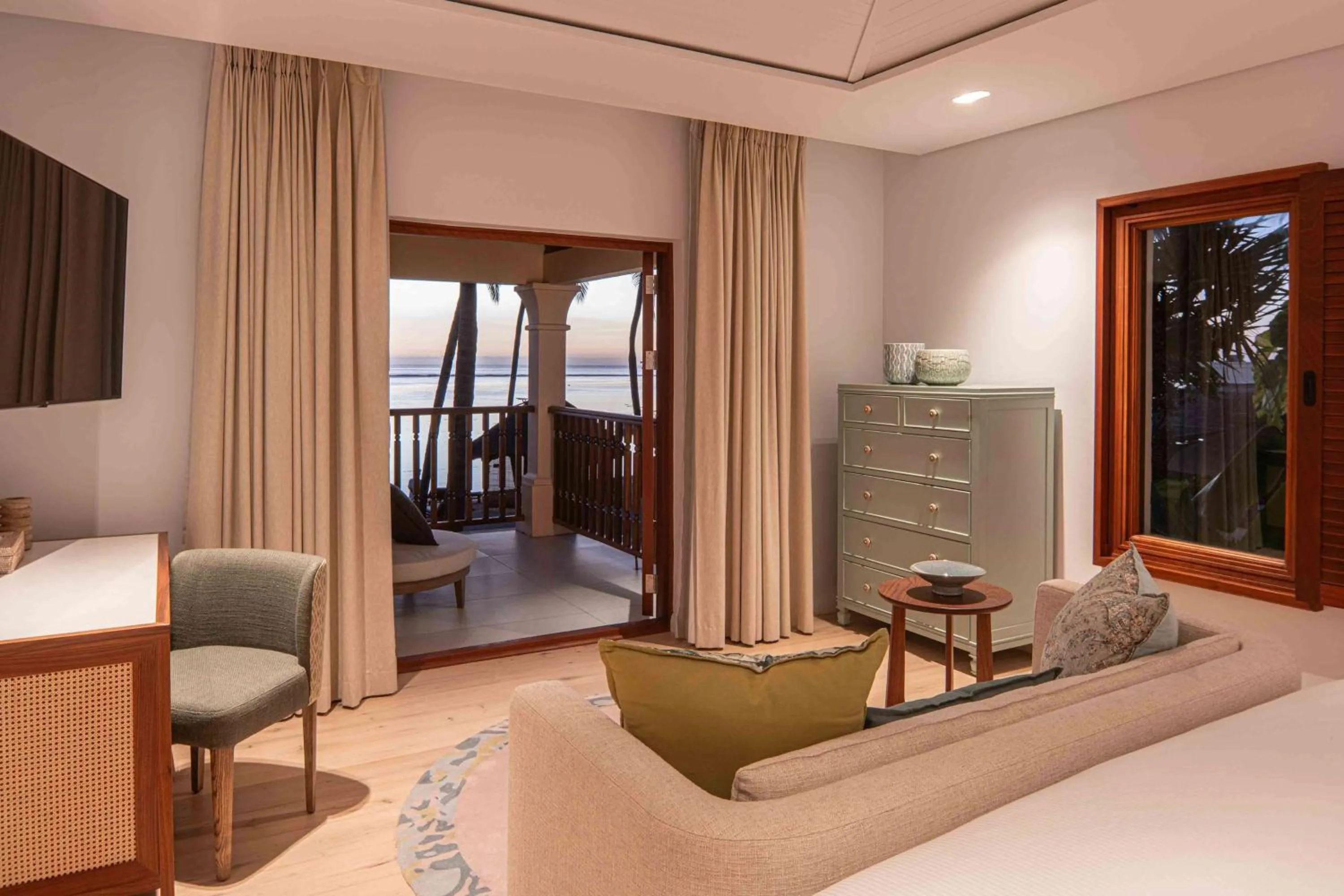 Living room, Bed in Hilton Mauritius Resort & Spa