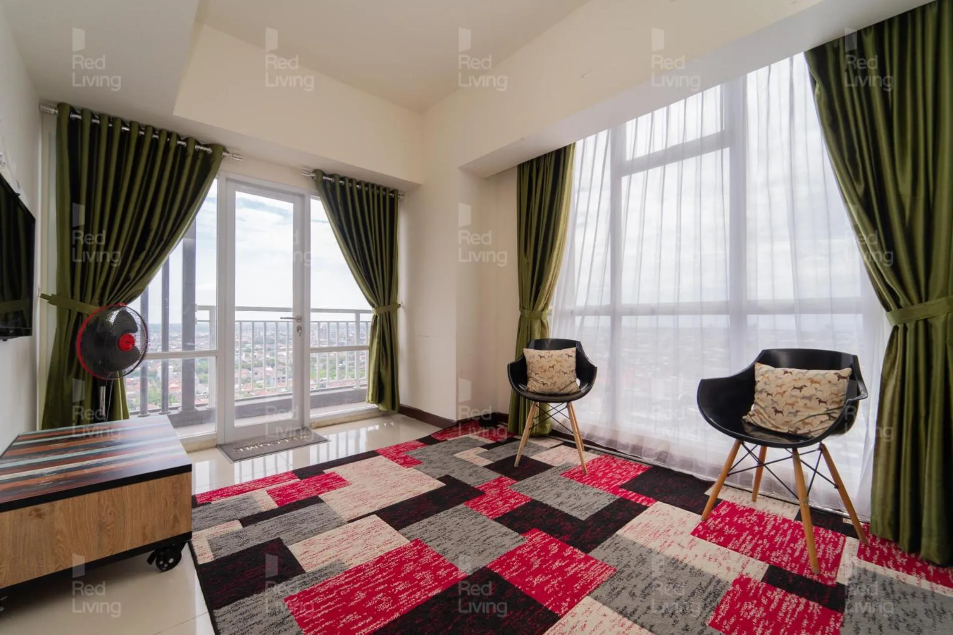 Living room, Bed in RedLiving Apartemen Vida View - Vida Connect