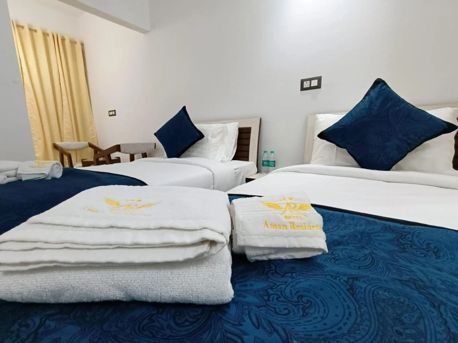 Photo of the whole room, Bed in Hotel Aman Residency
