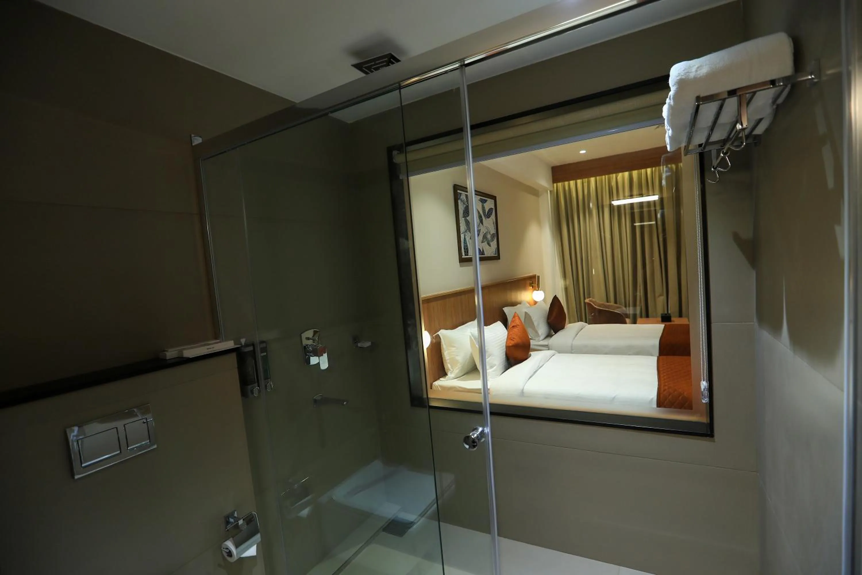 Shower, Bed in Hotel Saffron Wayanad