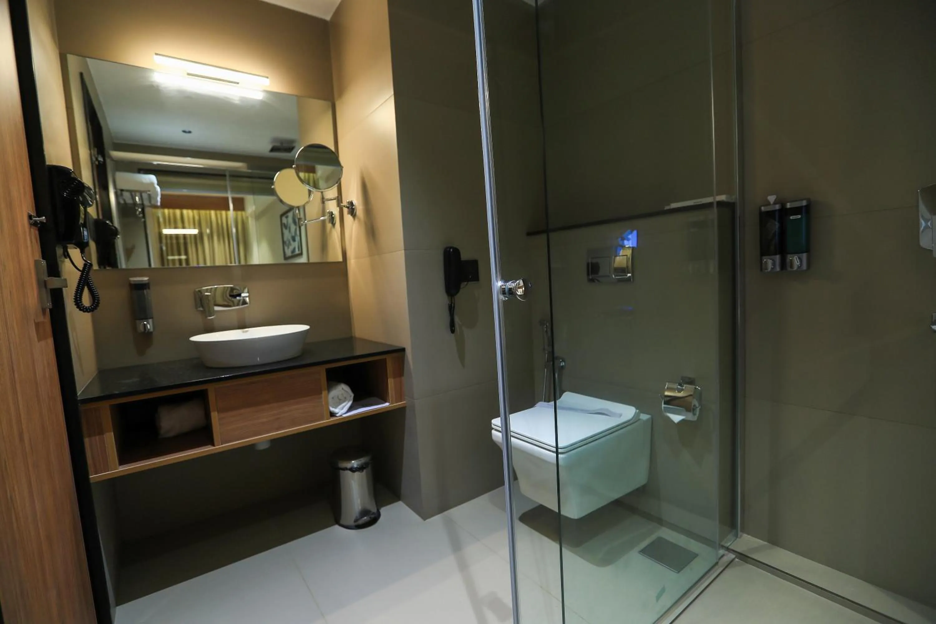 Shower in Hotel Saffron Wayanad