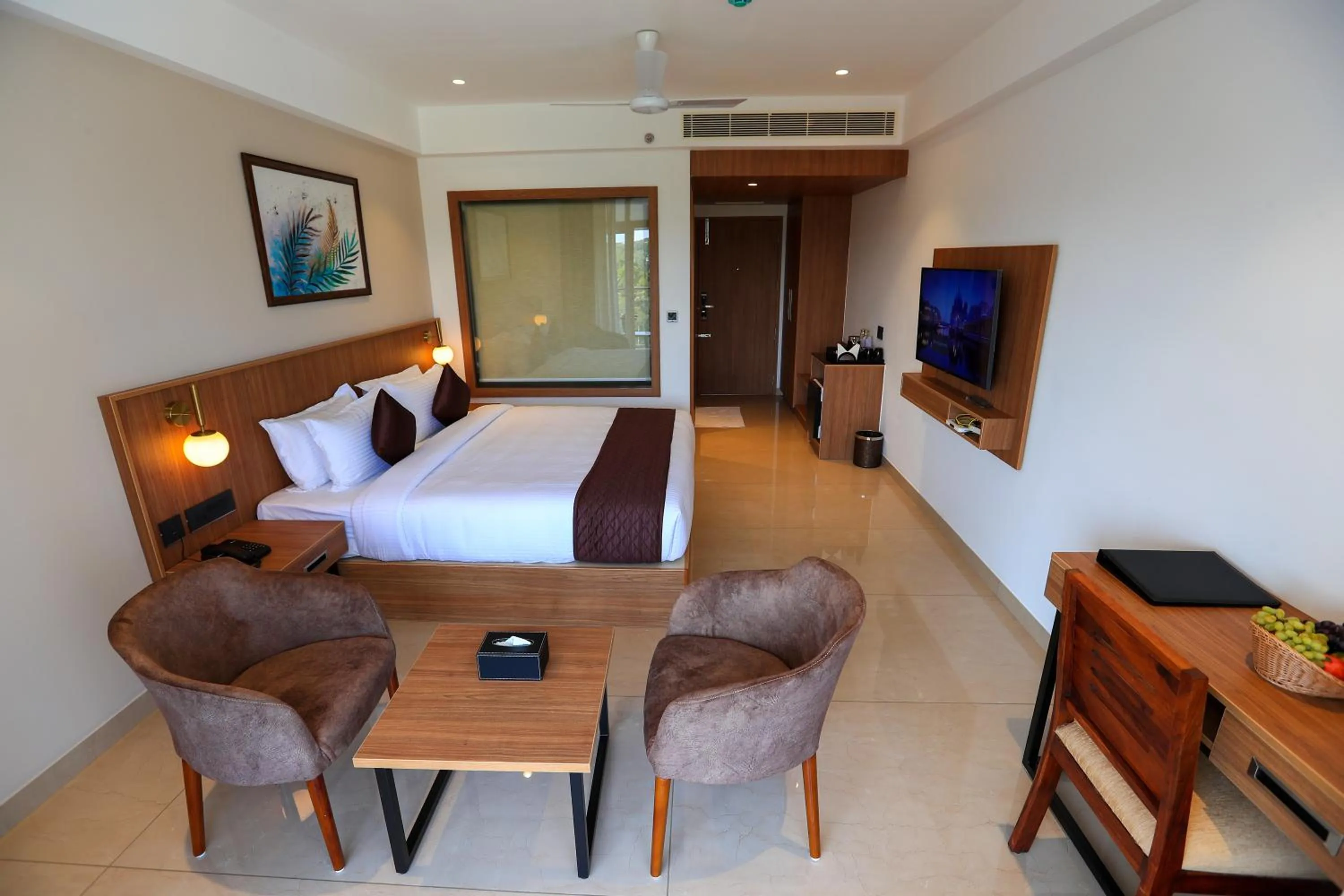 Photo of the whole room, Bed in Hotel Saffron Wayanad