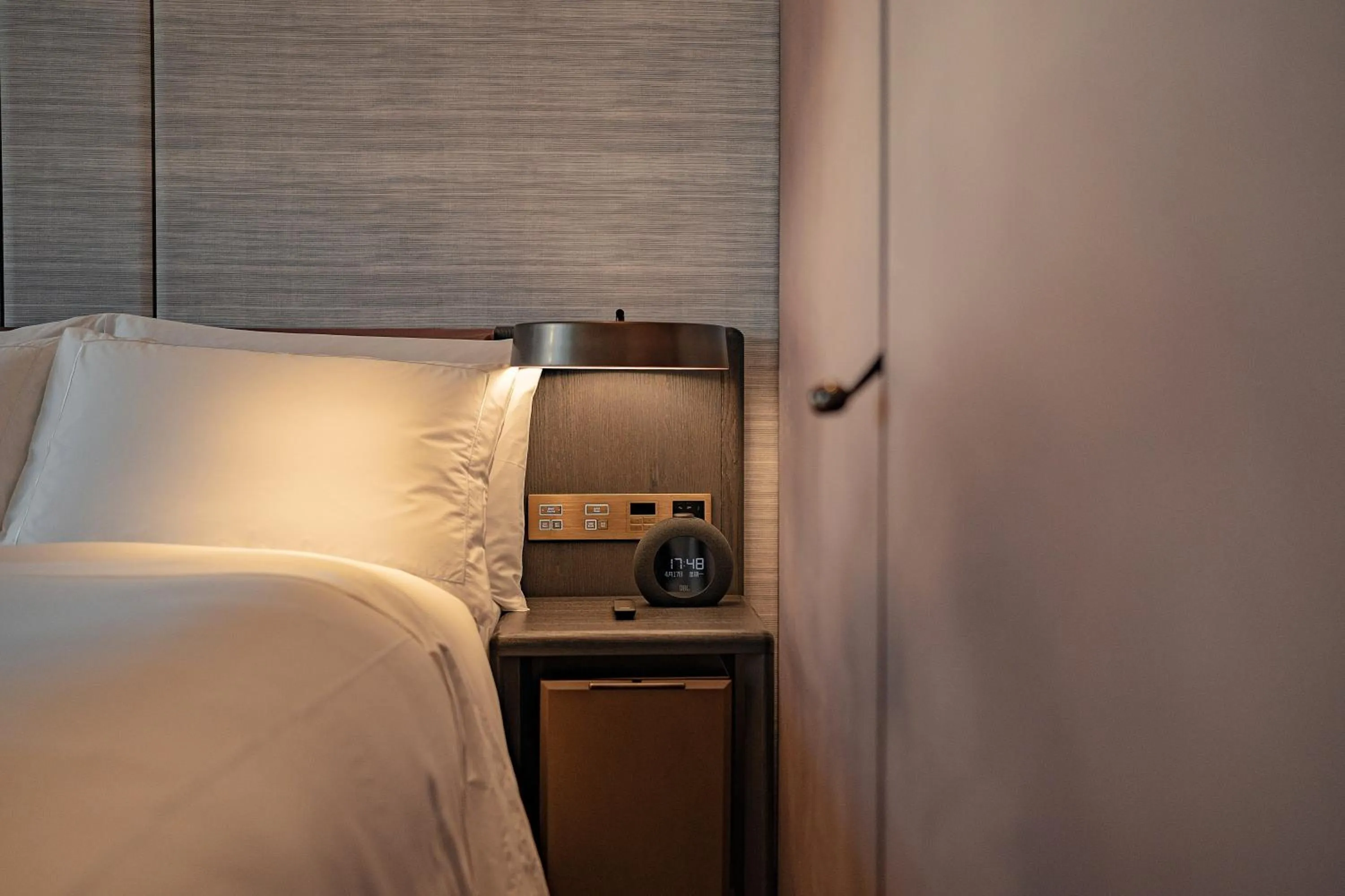 Decorative detail, Bed in Conrad Shenzhen, the first art museum hotel in Greater Bay Area with the stunning bay and sunset view in the hotel terrace