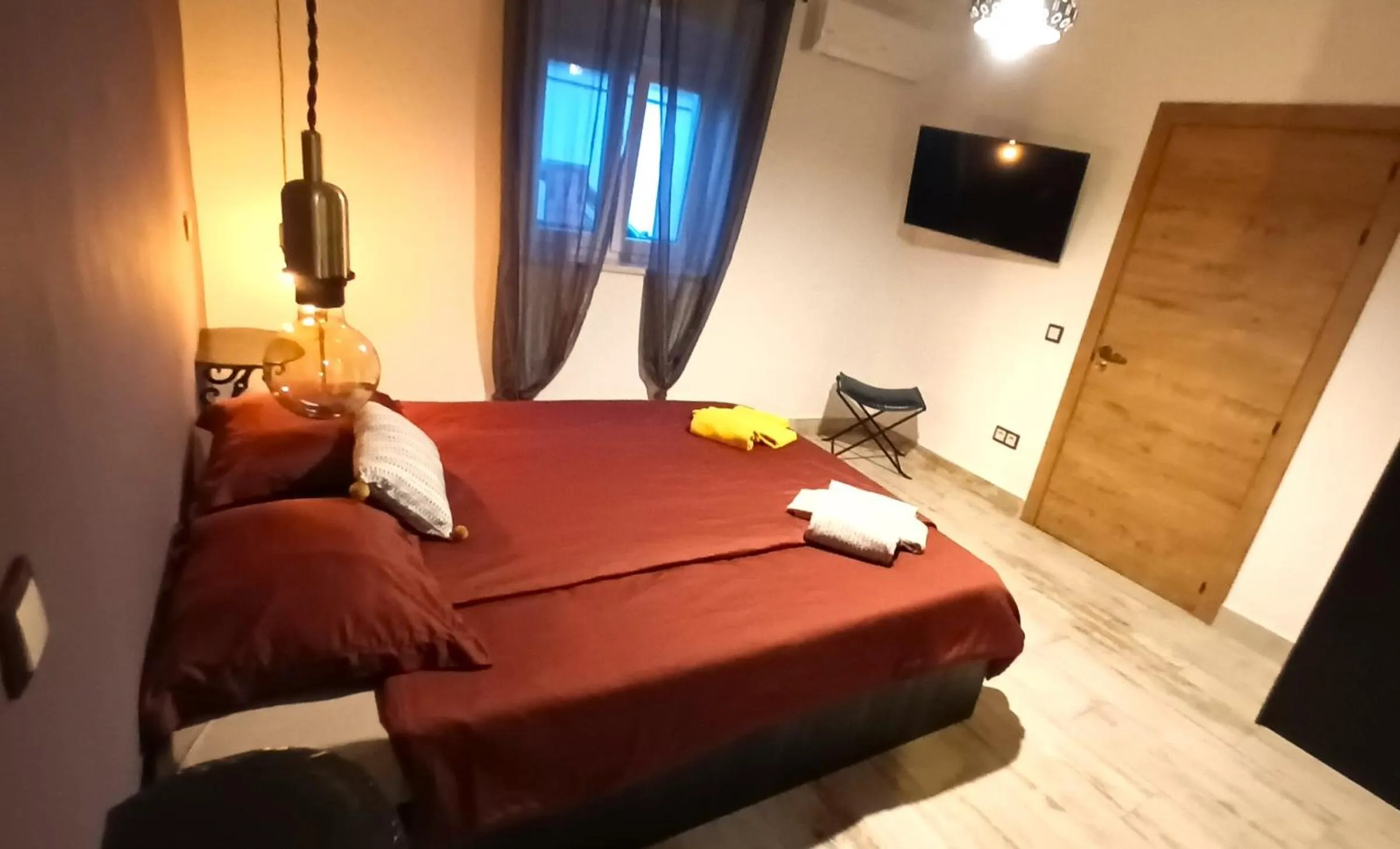 Bed in Aladin Comfort Country Rooms