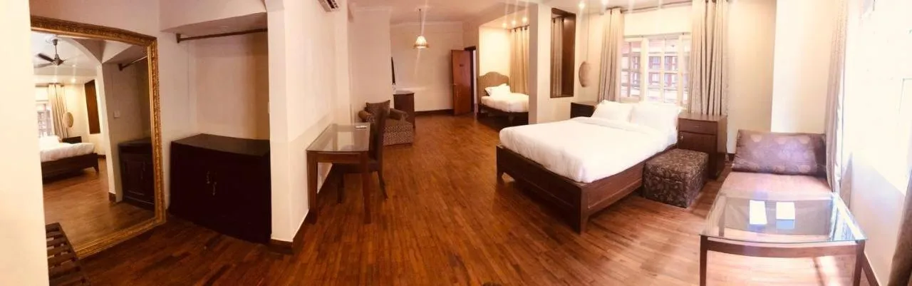 Bed in Courtyard Pujan Hotel