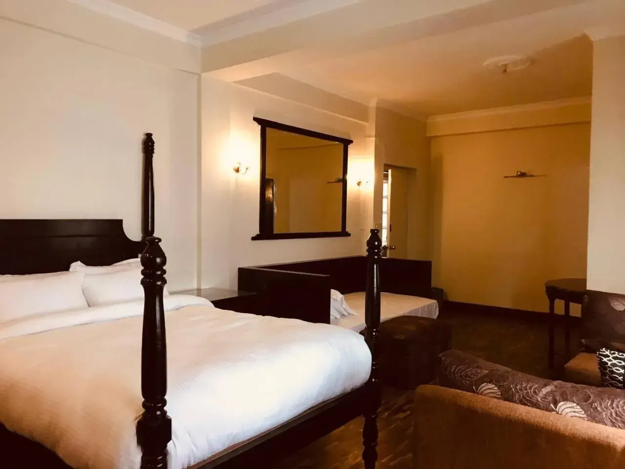 Suite - single occupancy in Courtyard Pujan Hotel Suite - single occupancy in Courtyard Pujan Hotel