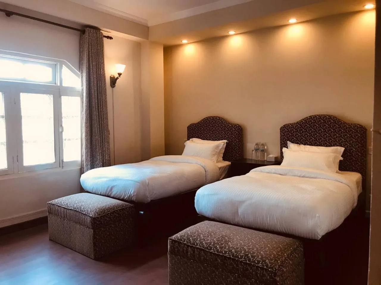 Bed in Courtyard Pujan Hotel