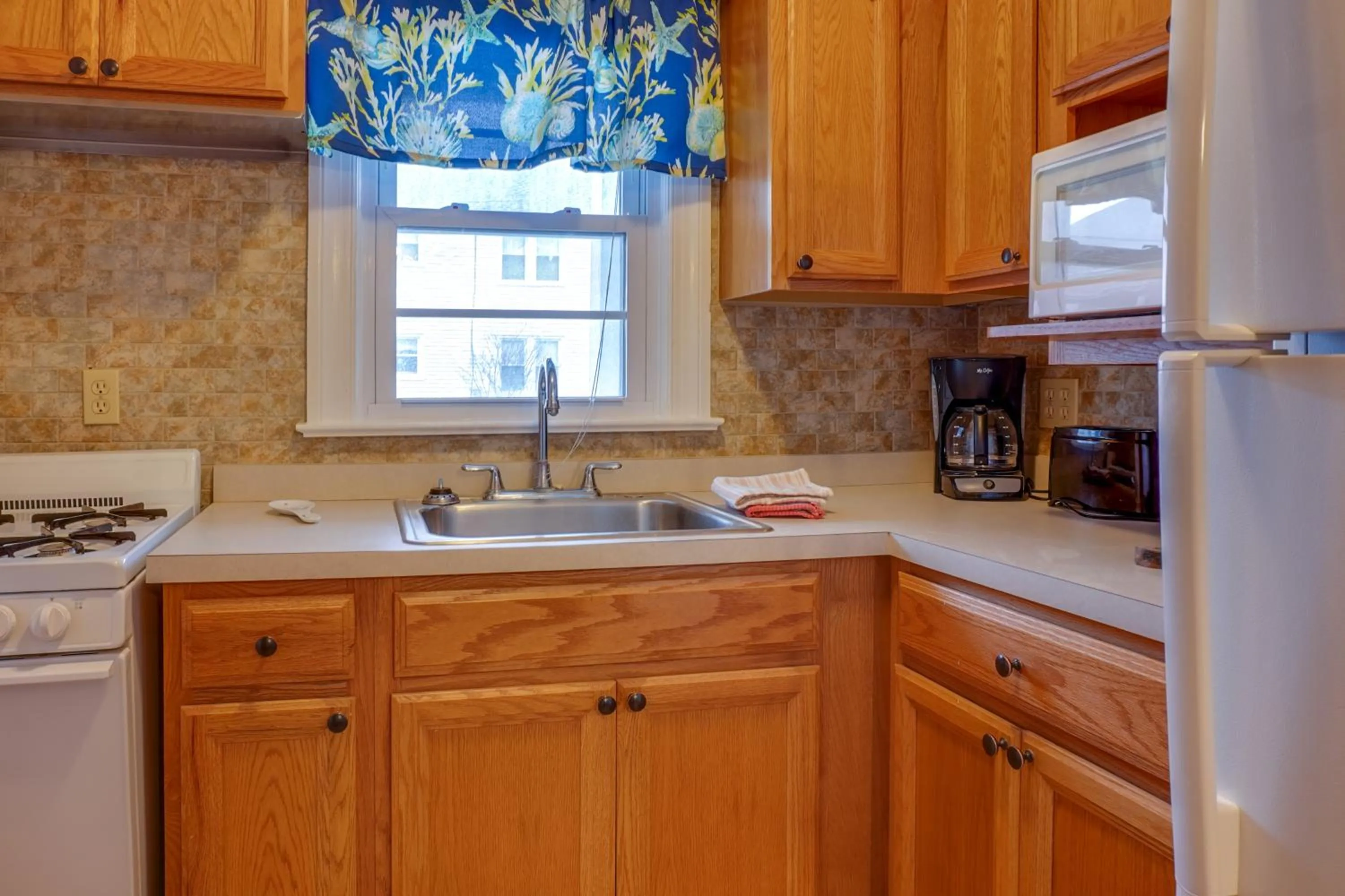 Kitchen or kitchenette in Ocean Terrace Family Apartments