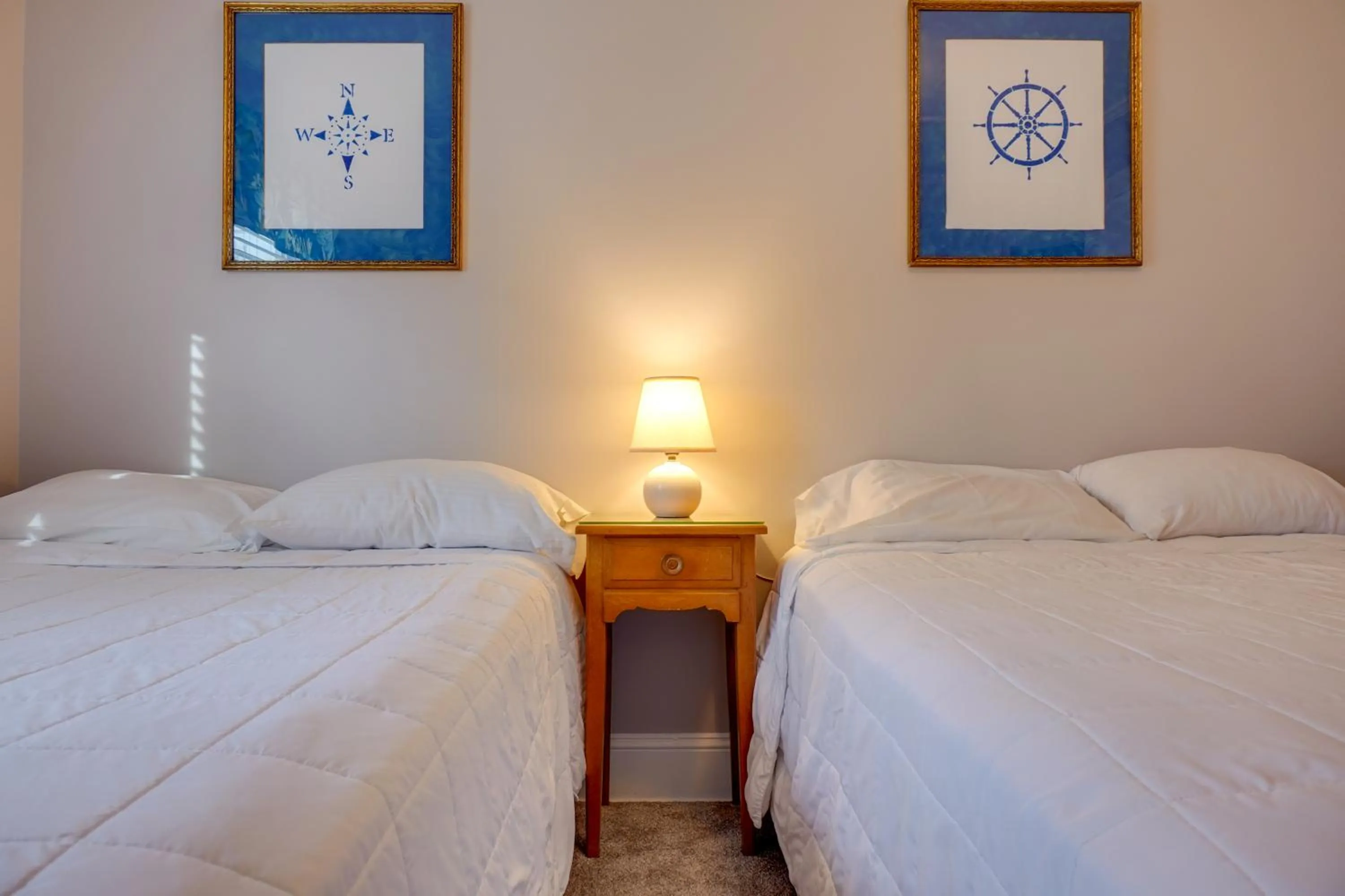 Bed in Ocean Terrace Family Apartments