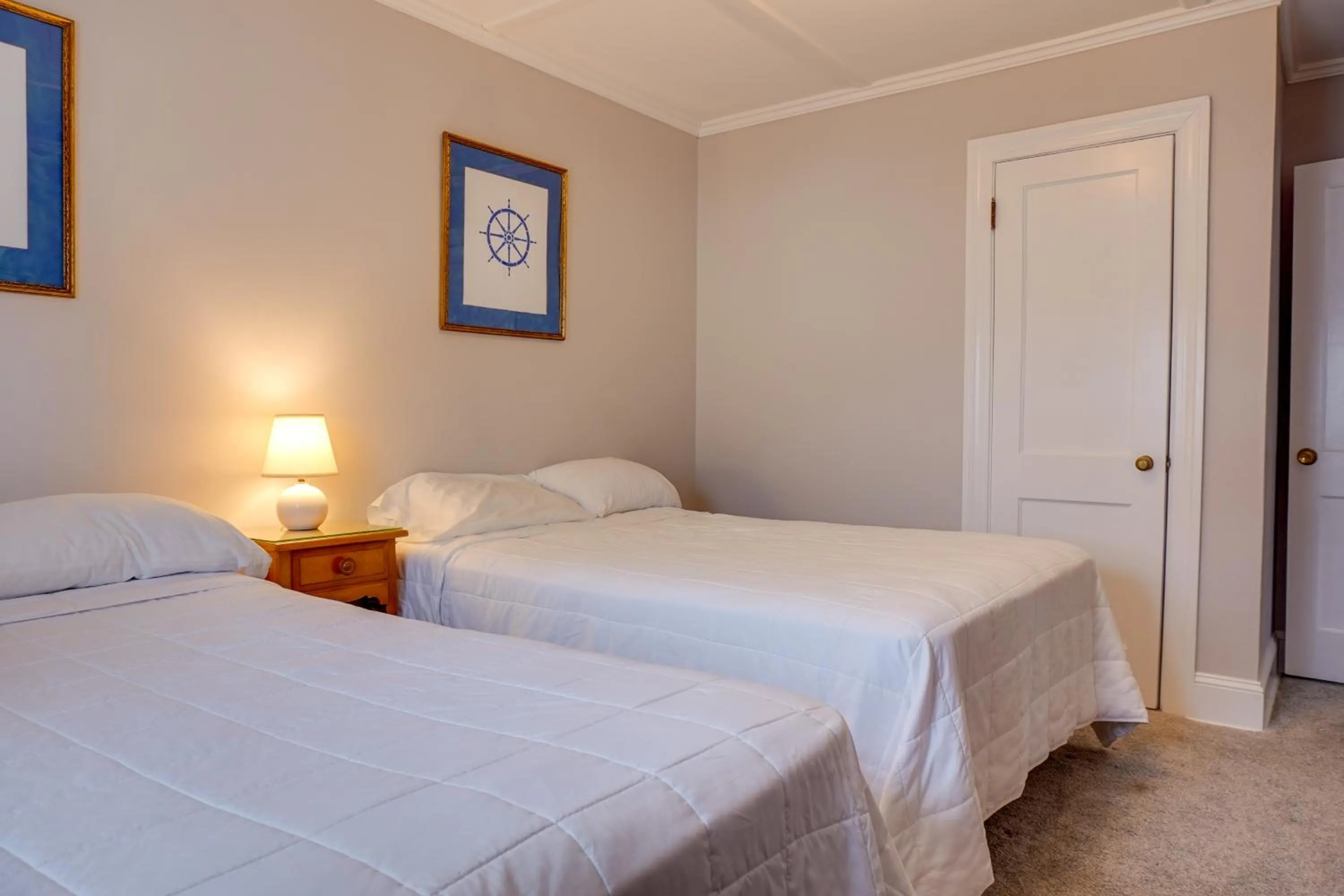 Bed in Ocean Terrace Family Apartments