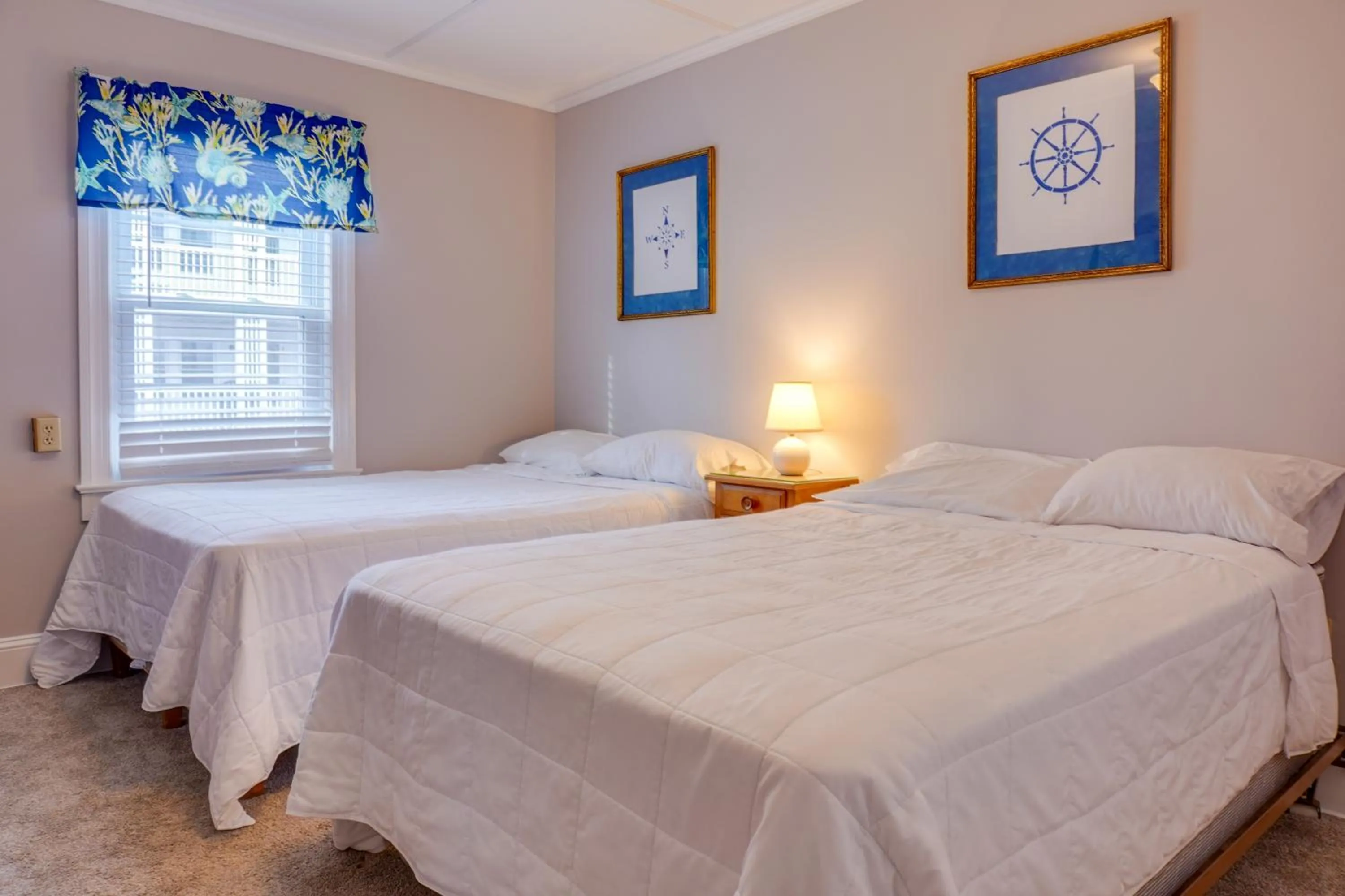 Bed in Ocean Terrace Family Apartments