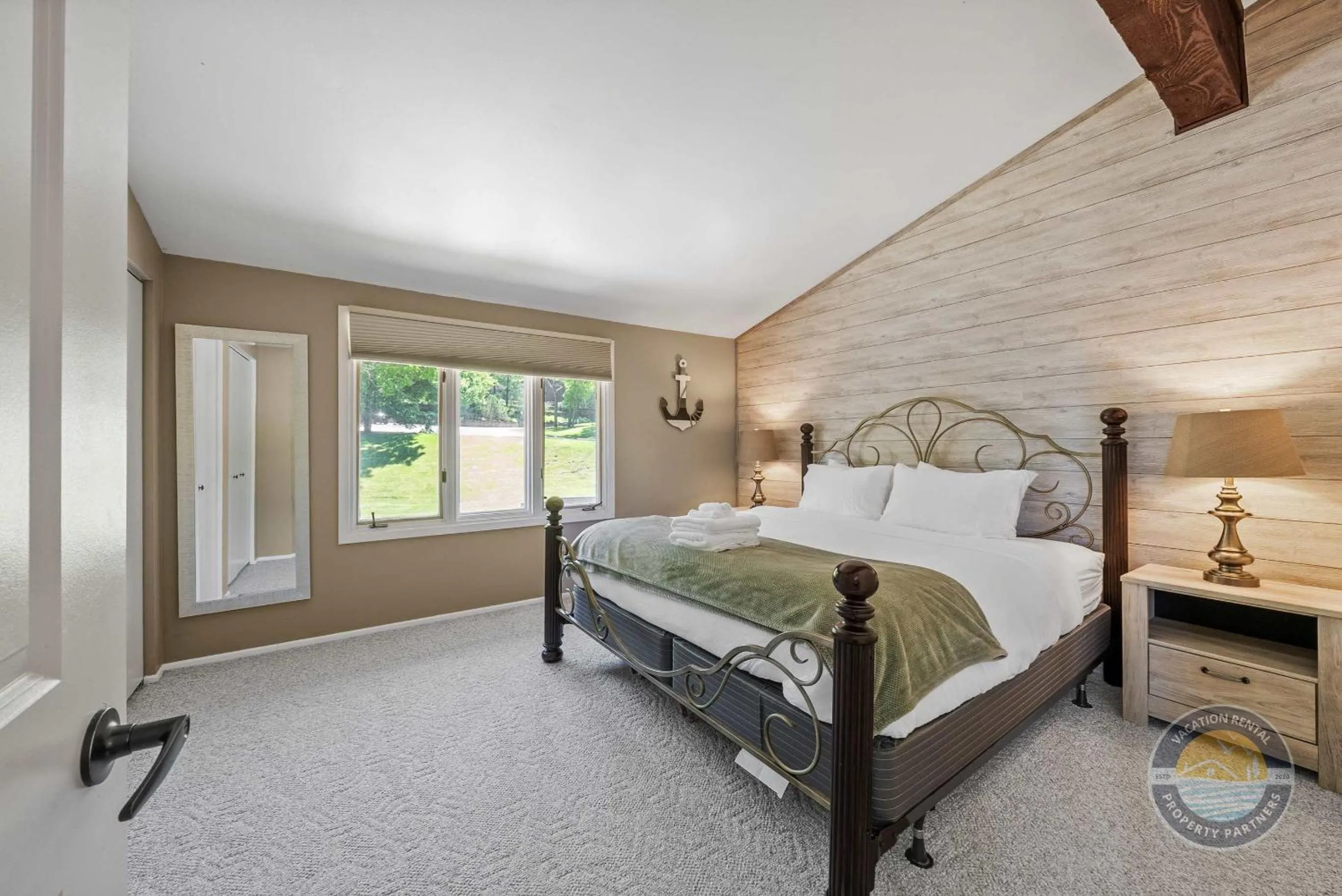 Bed in New Lake Como Condo with Lake Views