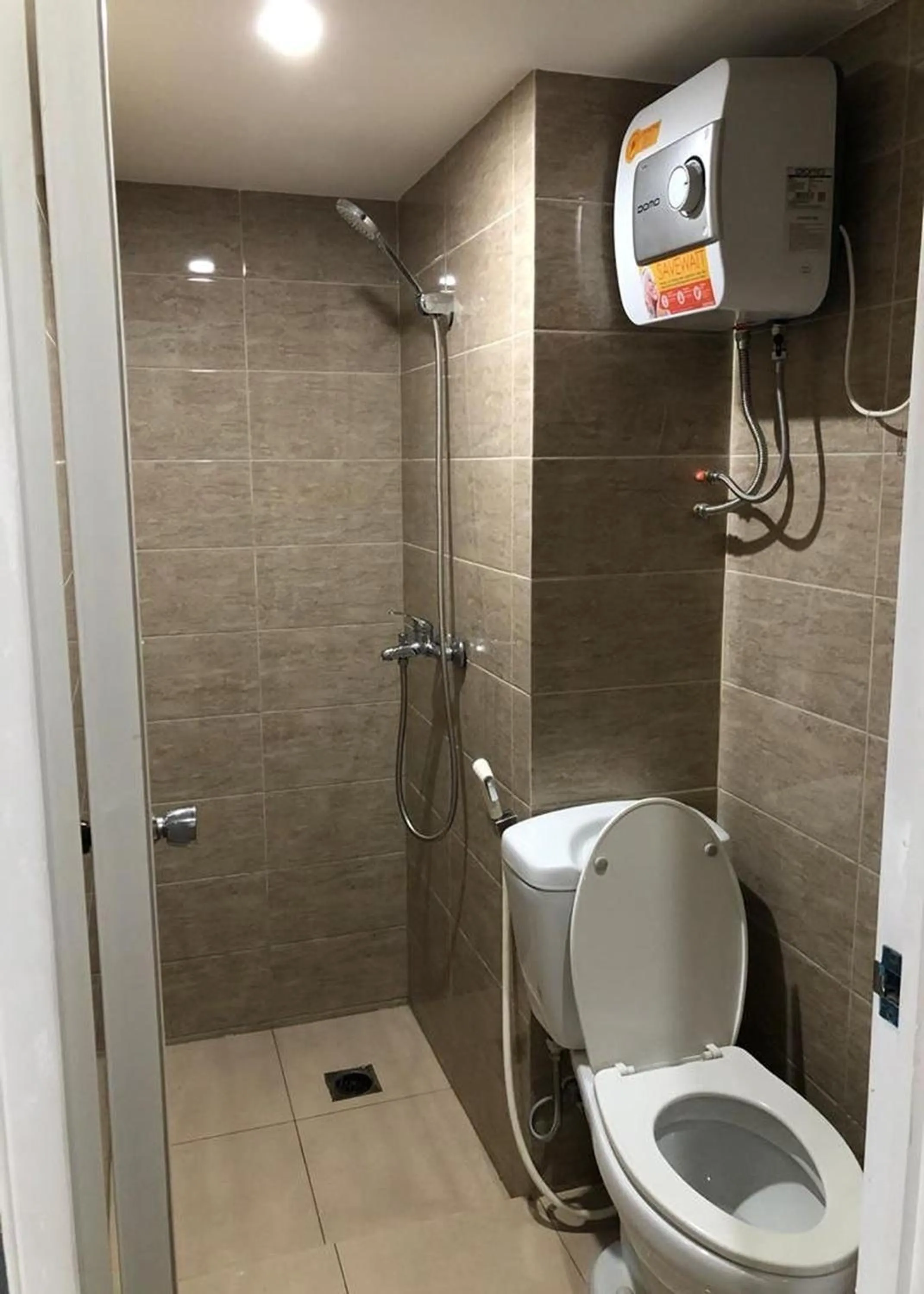 Bathroom in Cozy Room @ Hallo Tidur by Tio