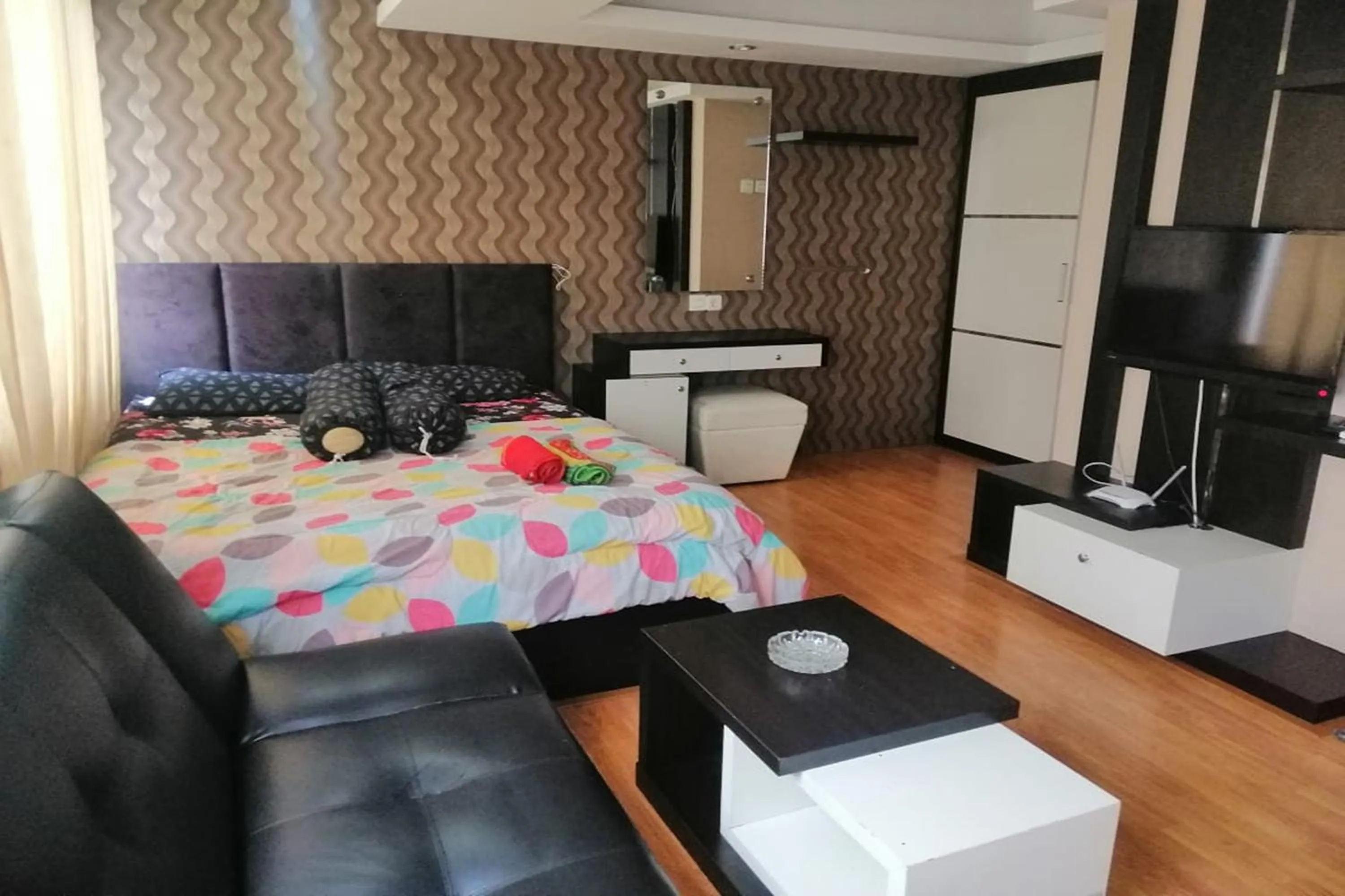 Bed in Cozy Room @ Hallo Tidur by Tio