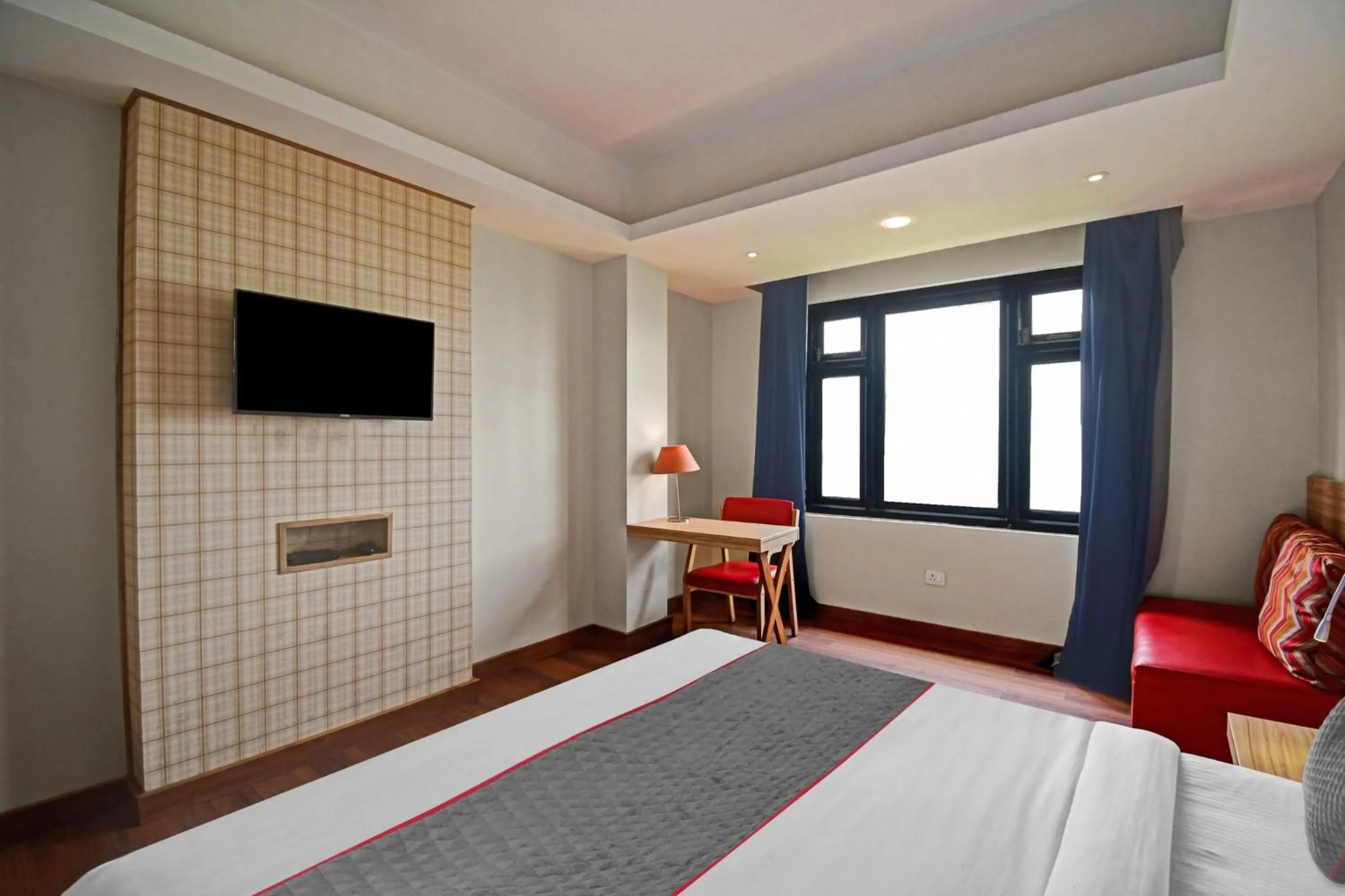 Bedroom in Townhouse Mansarovar Hotel