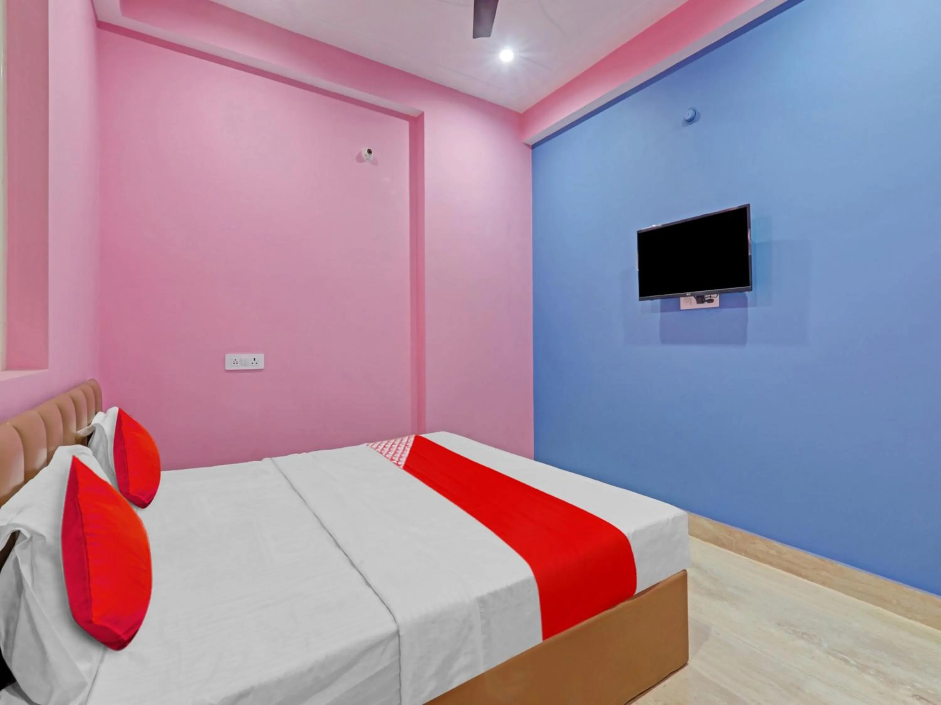 Bedroom in Hotel O SRV INN