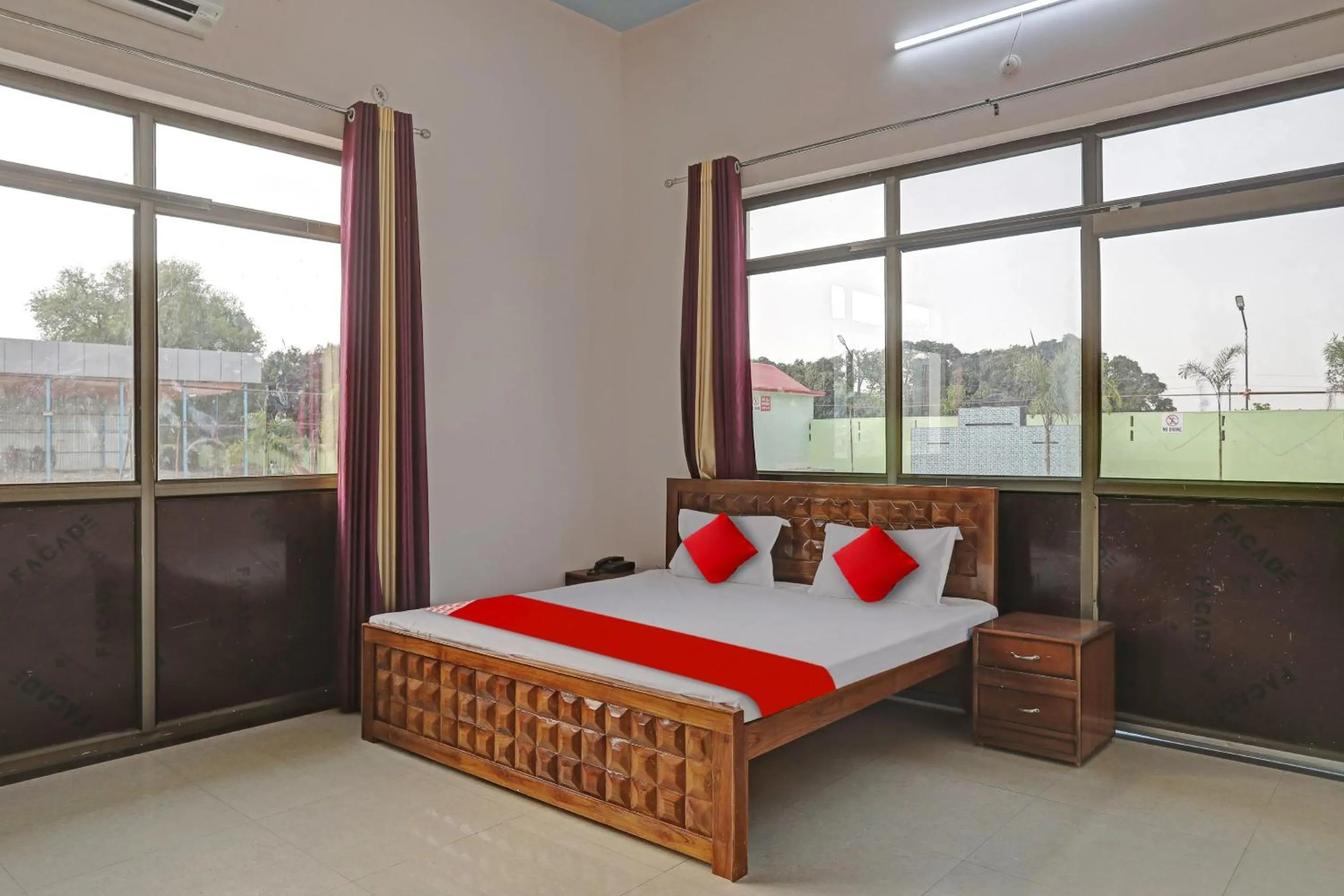 Bedroom, Bed in Hotel O Mb Garden & Resorts