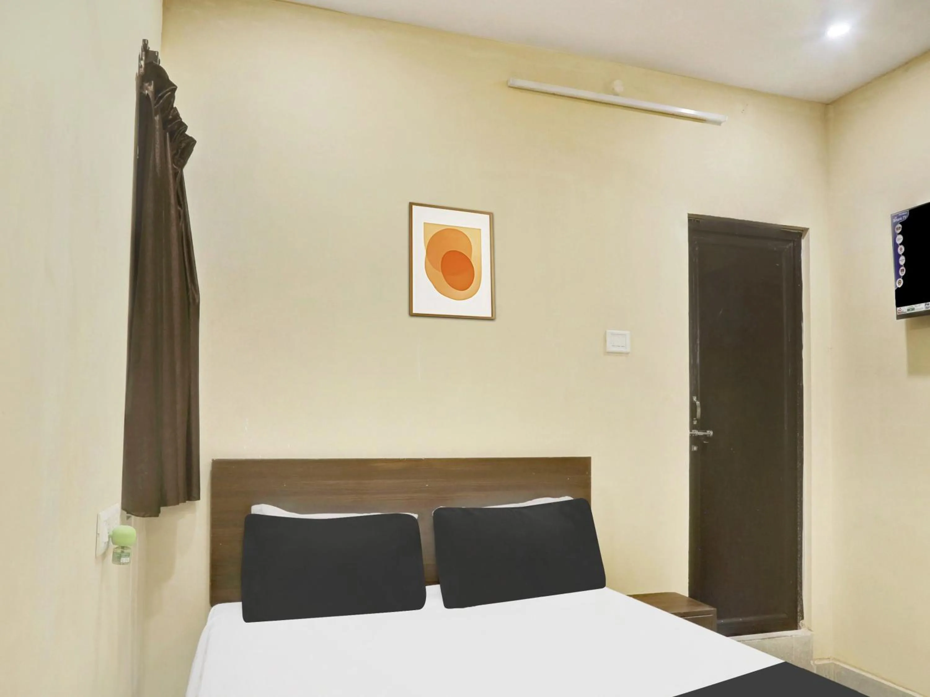 Bedroom in SPOT ON Grand Mantralayam