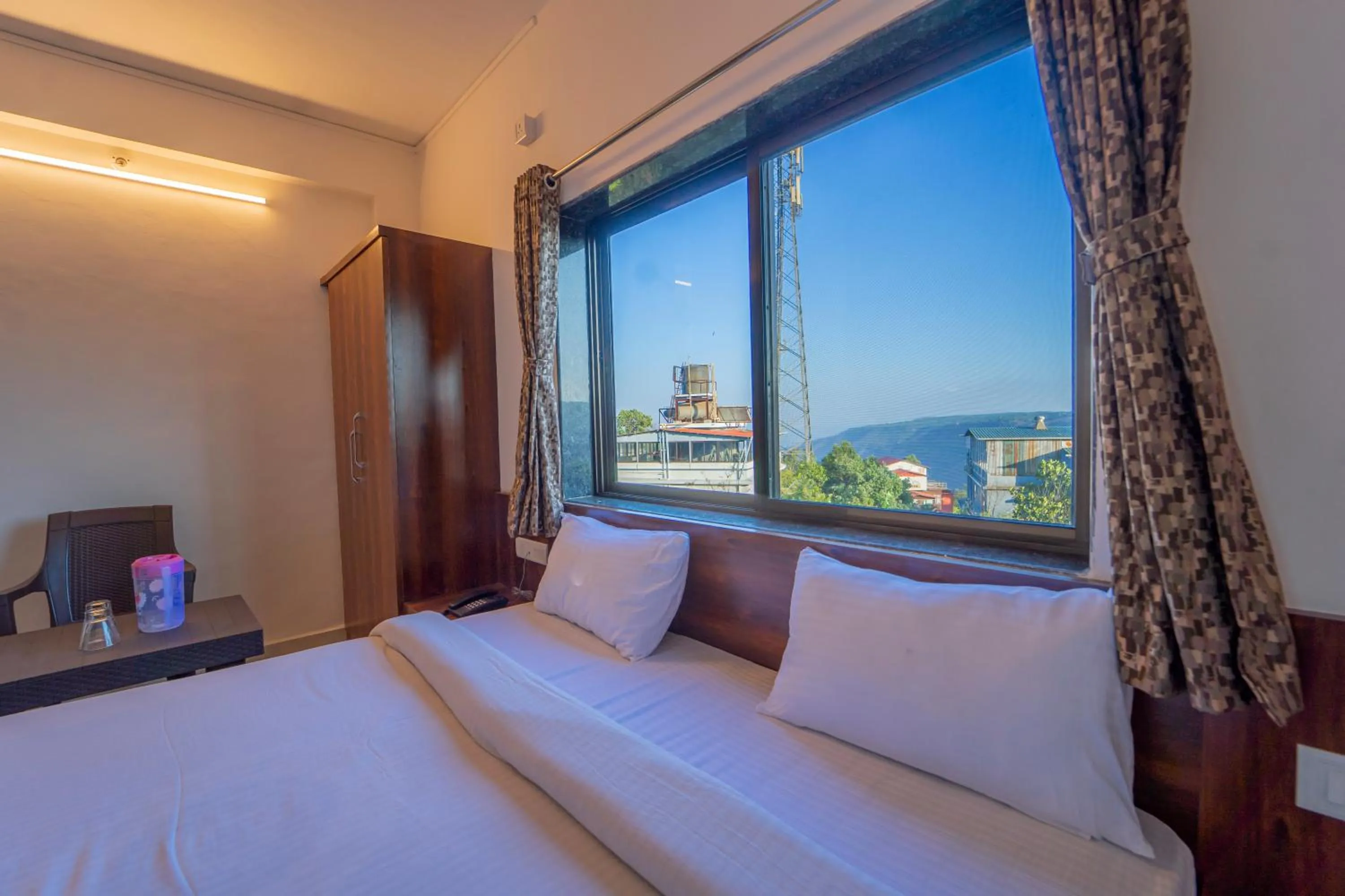 View (from property/room), Bed in Dhimahi Residency