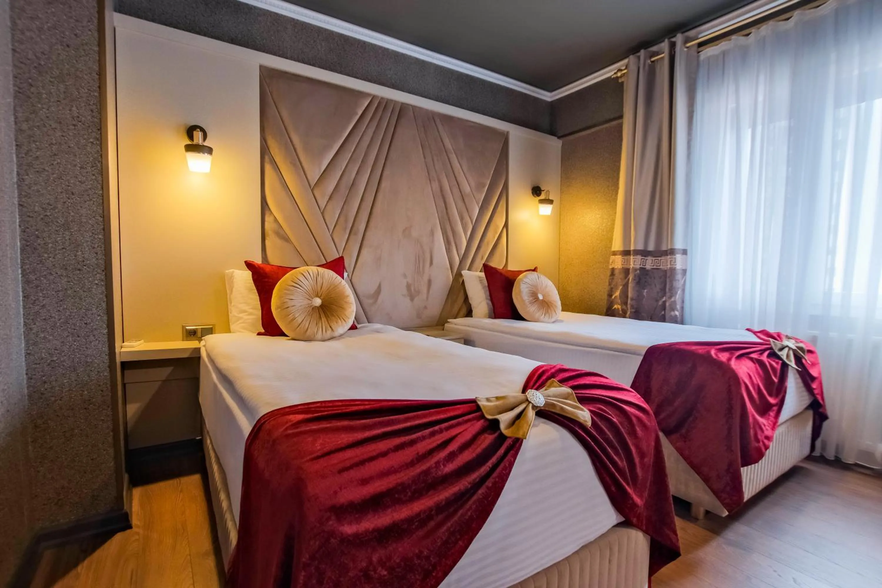 Bed in MOONDAY HOTEL