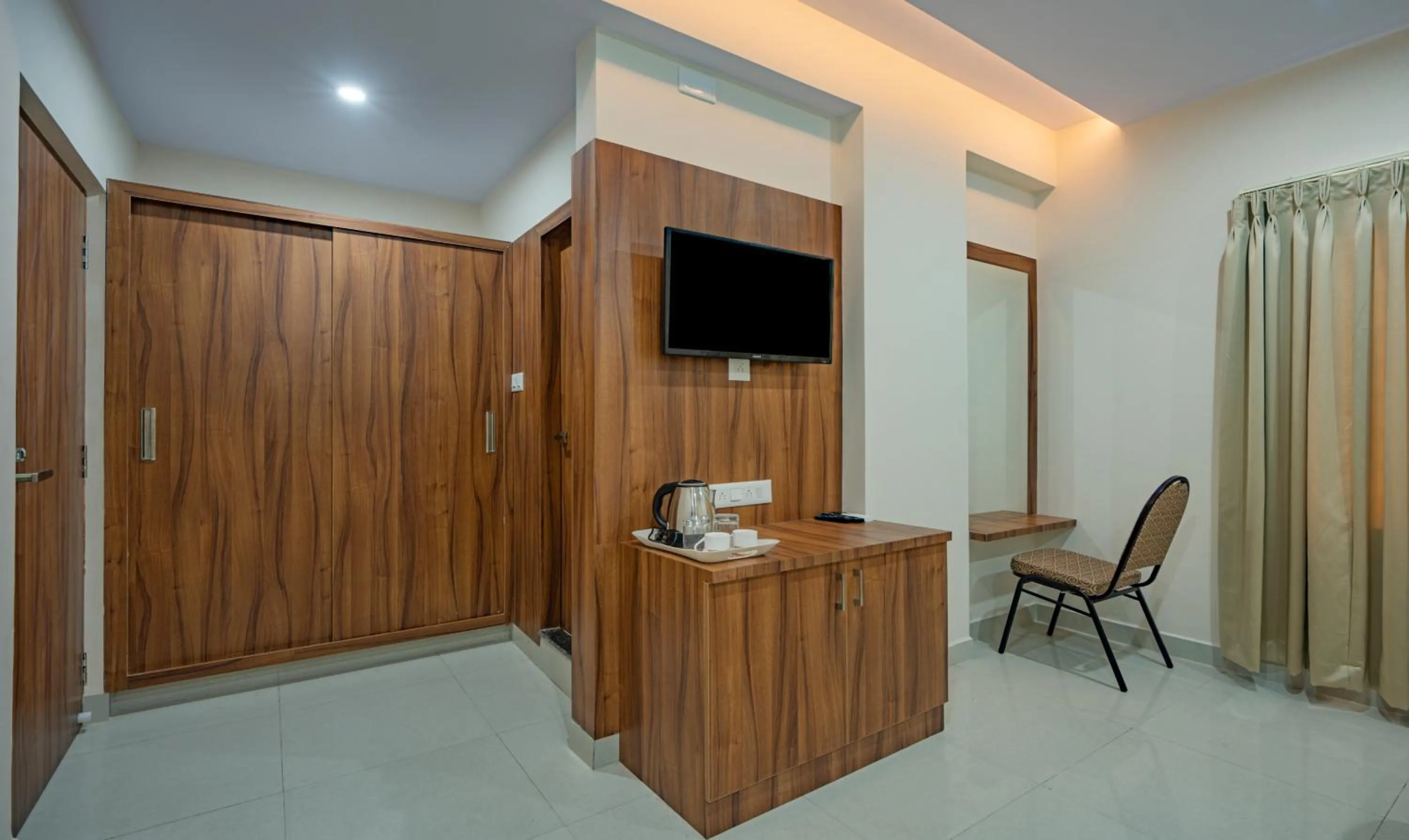 TV and multimedia in Treebo Global Stay, Uttarahalli