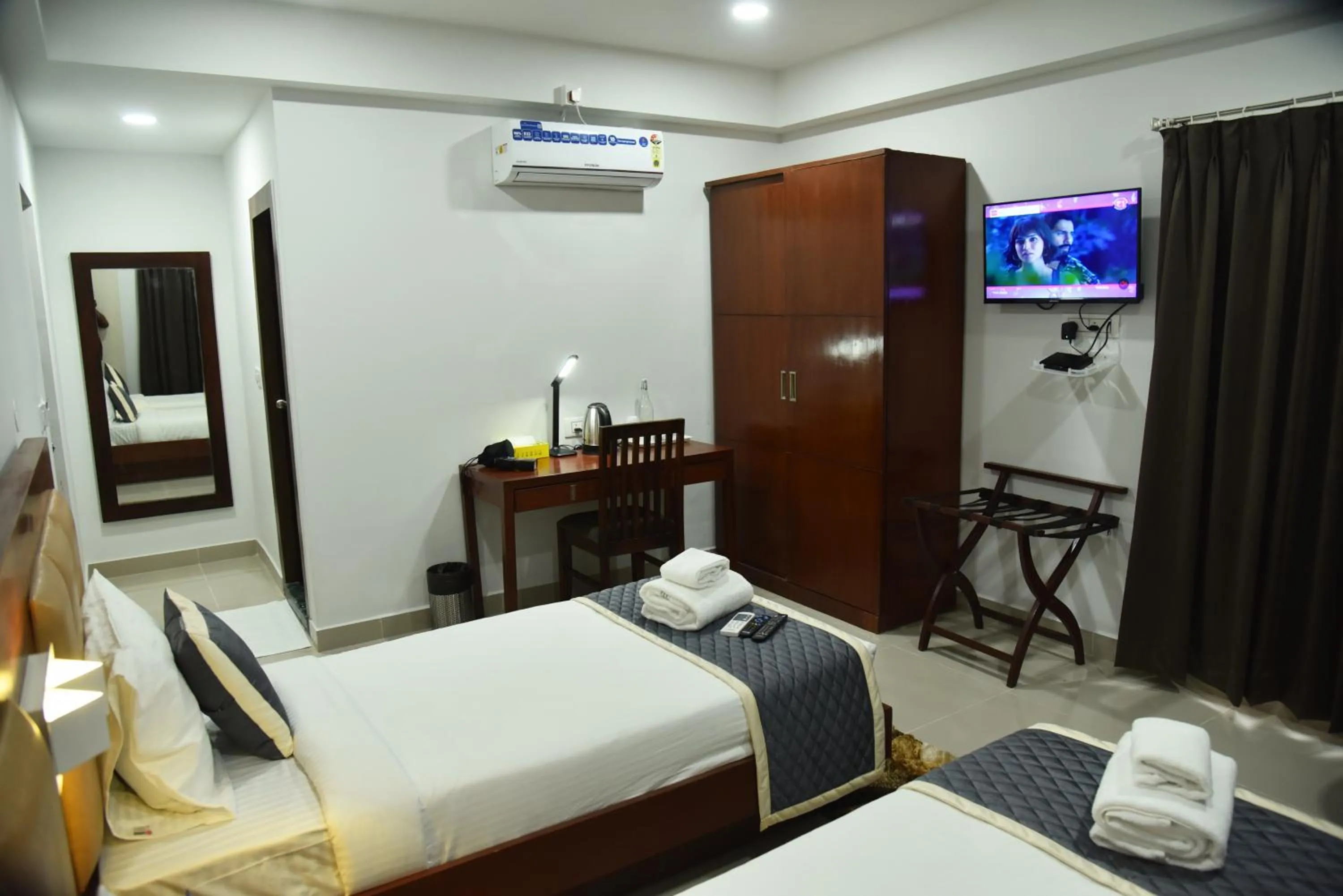 TV and multimedia, Bed in The Altruist Business Stays- New Town, Kolkata