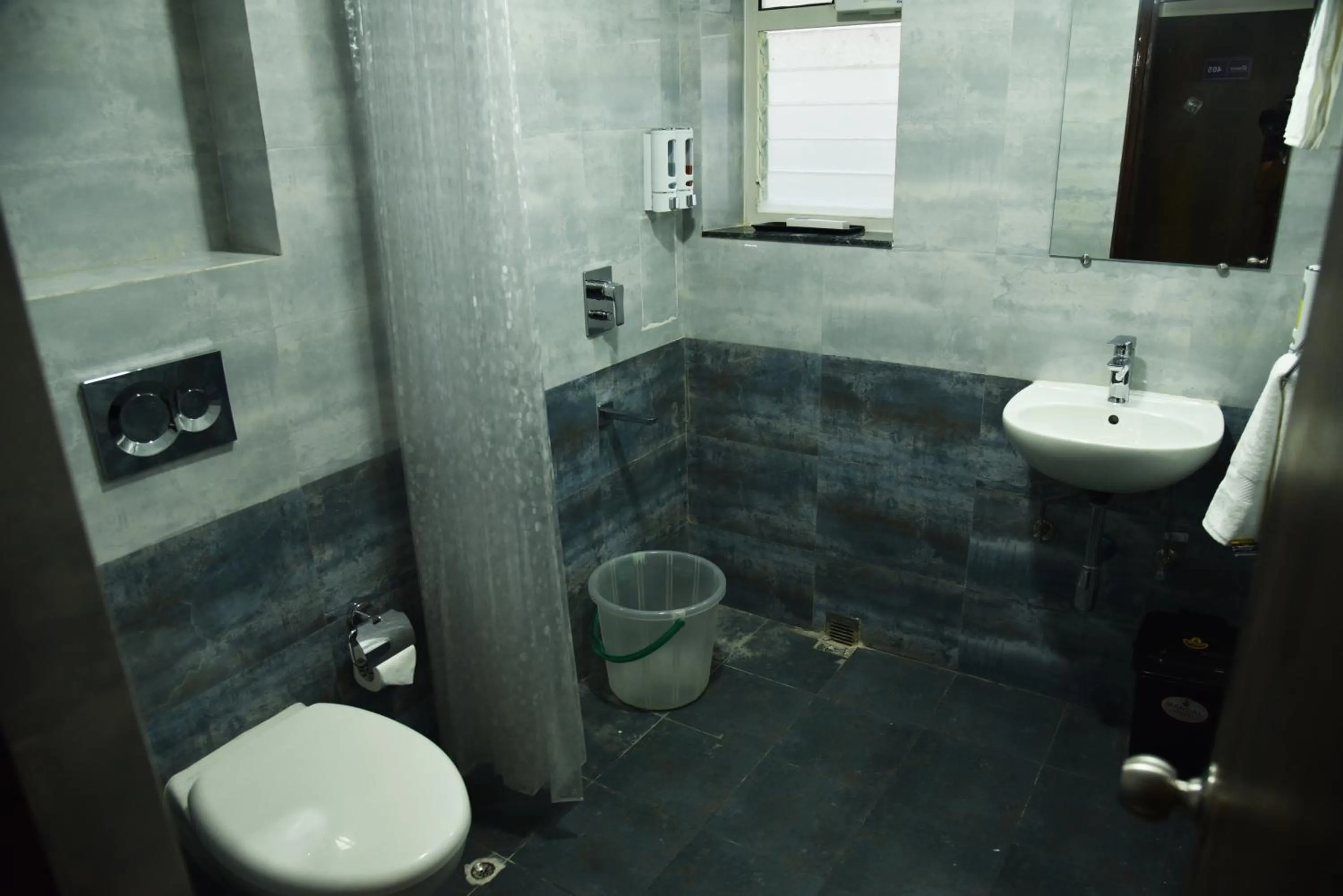 Bathroom in The Altruist Business Stays- New Town, Kolkata