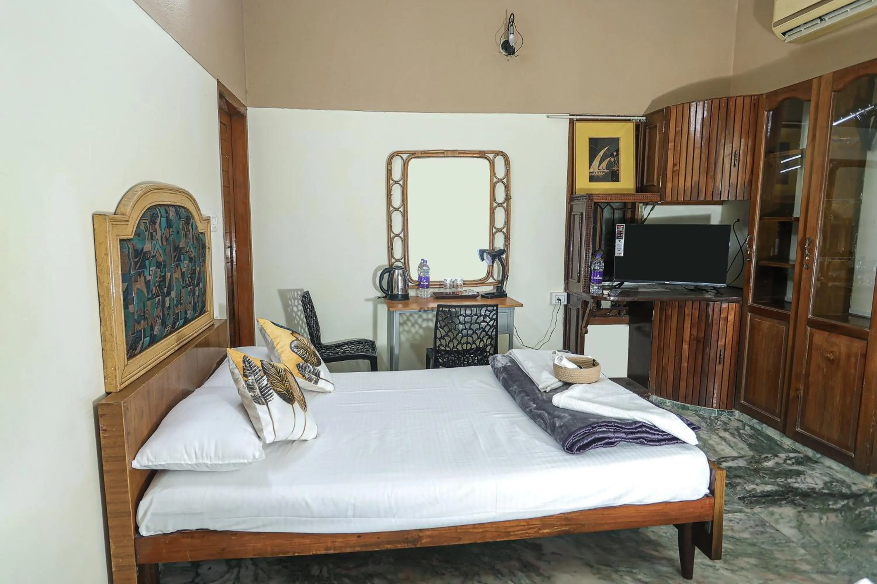 Bed in NALINAM HOMESTAY
