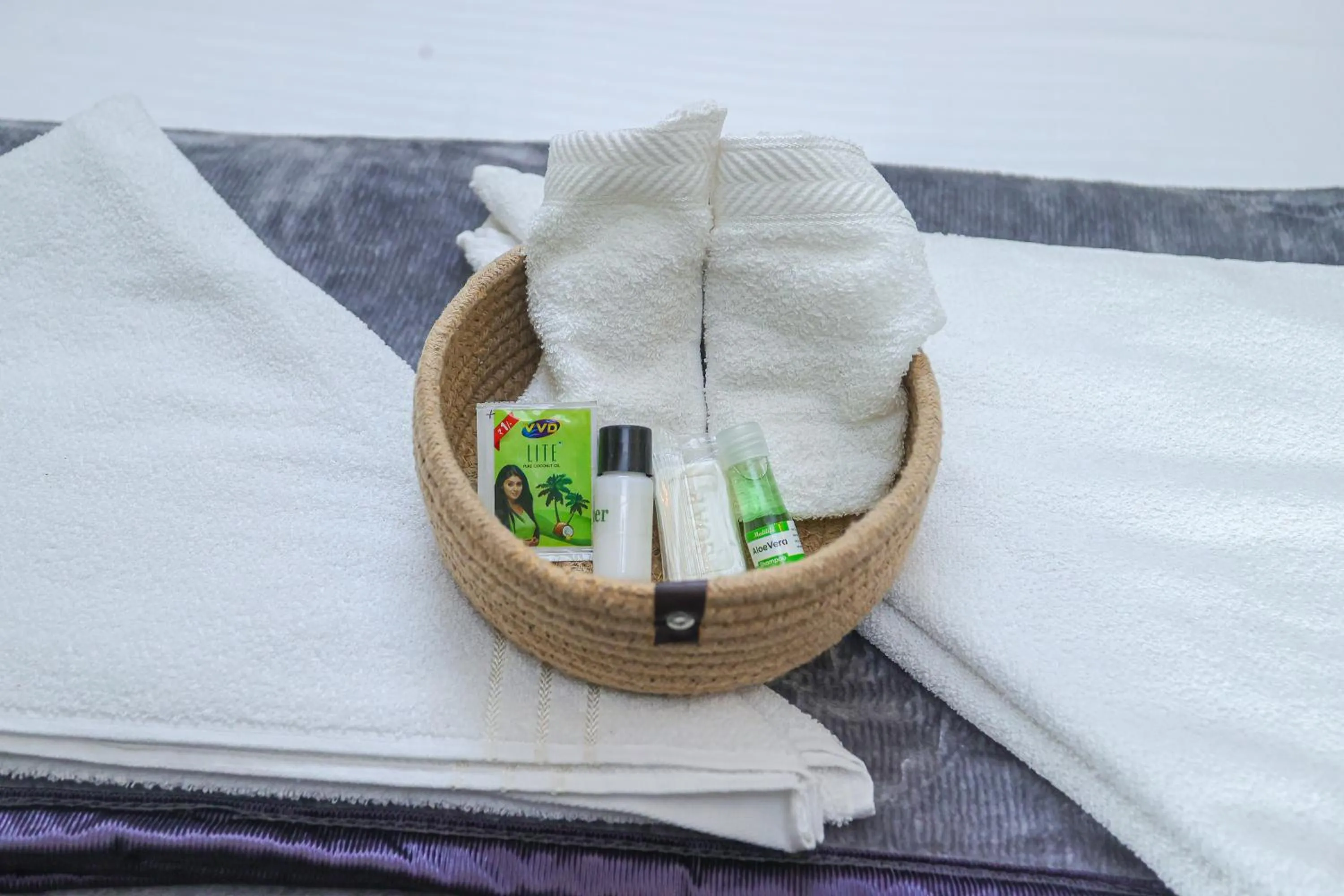 Bed in NALINAM HOMESTAY