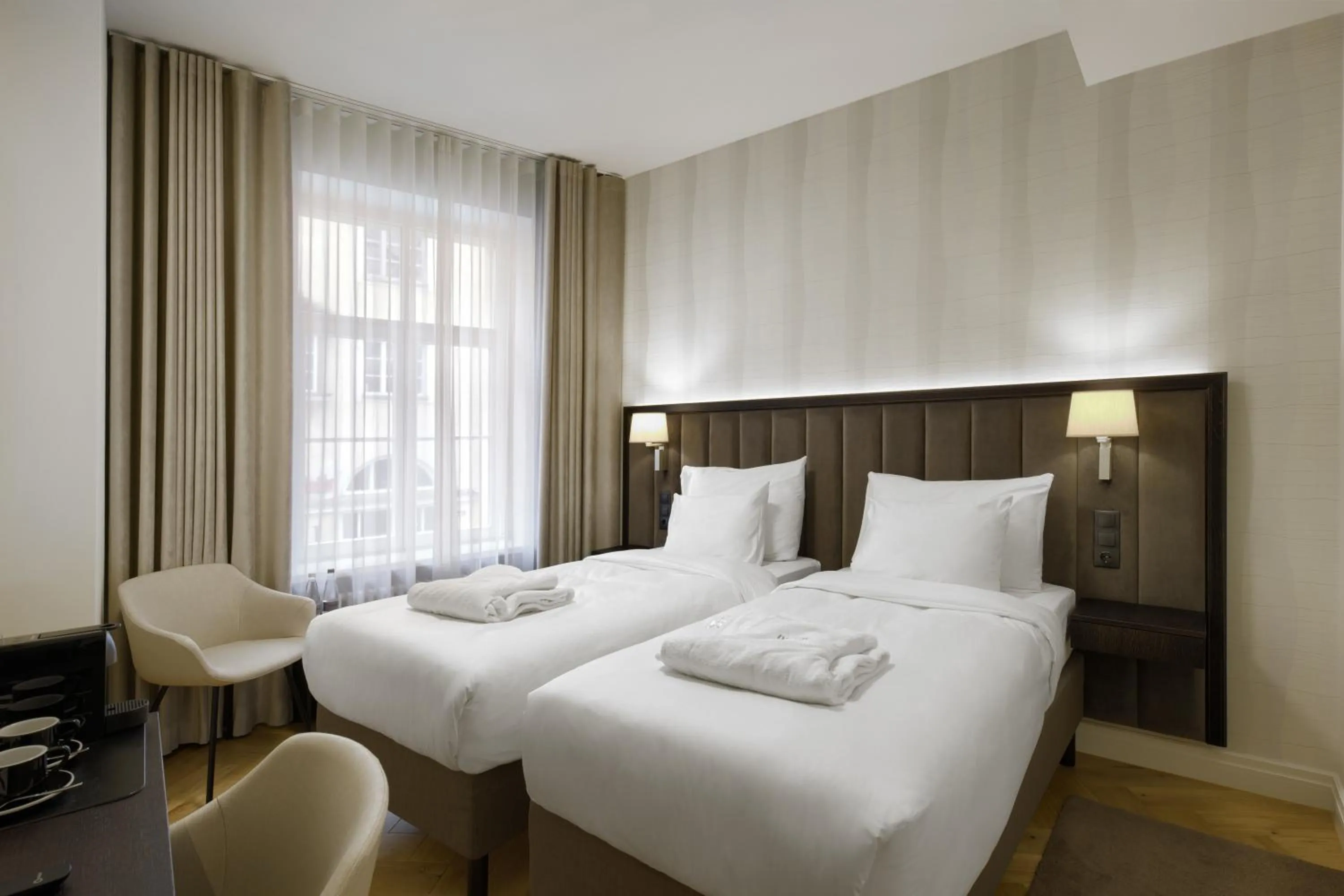 Bed in Nunne Boutique Hotel