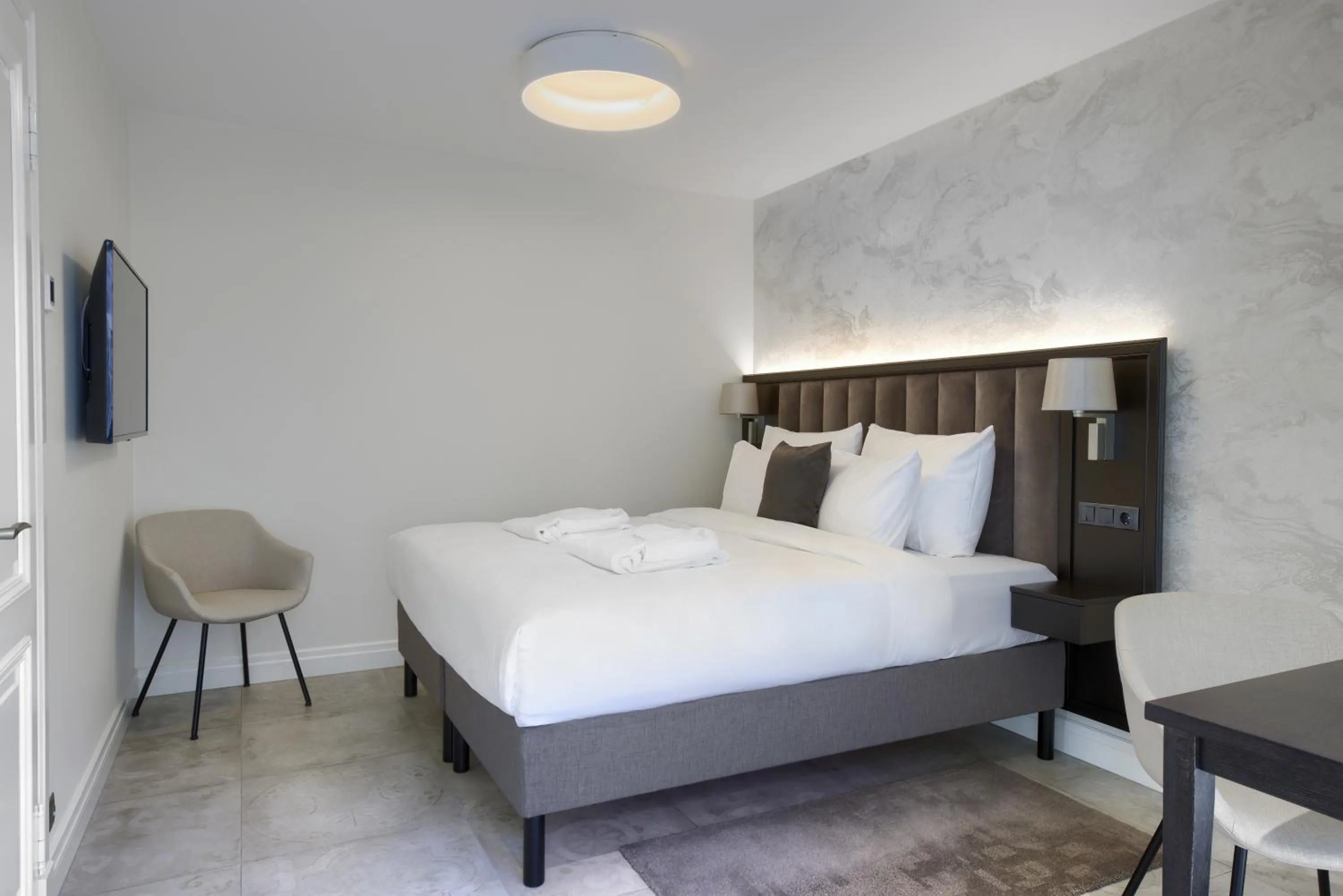 Bed in Nunne Boutique Hotel