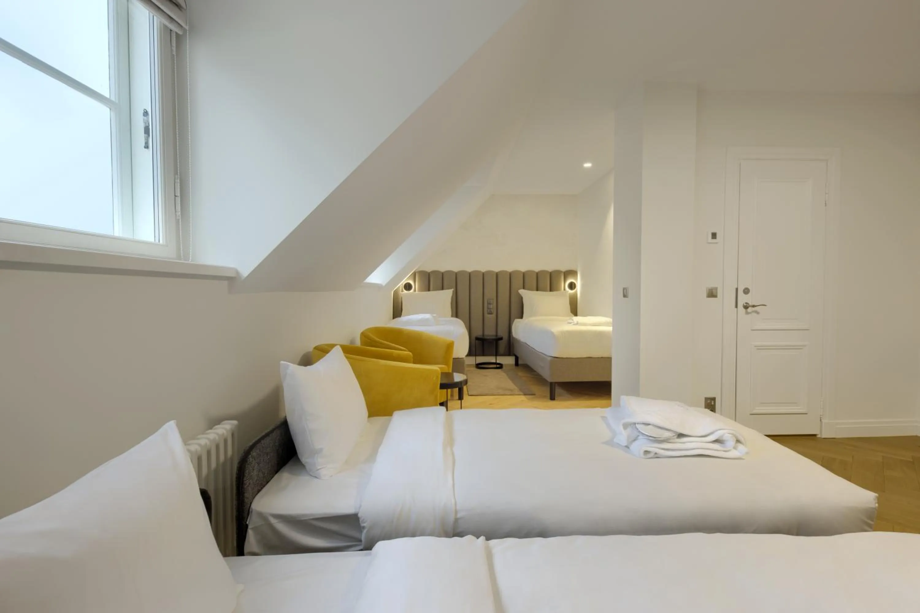 Bed in Nunne Boutique Hotel