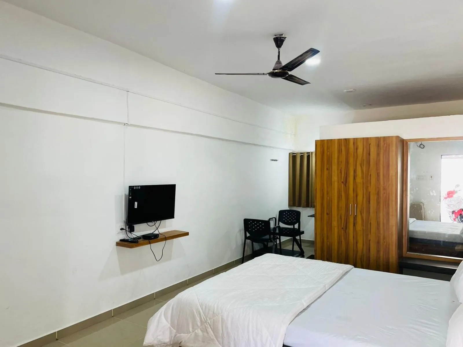 Bed in Vasant Vihar Resort