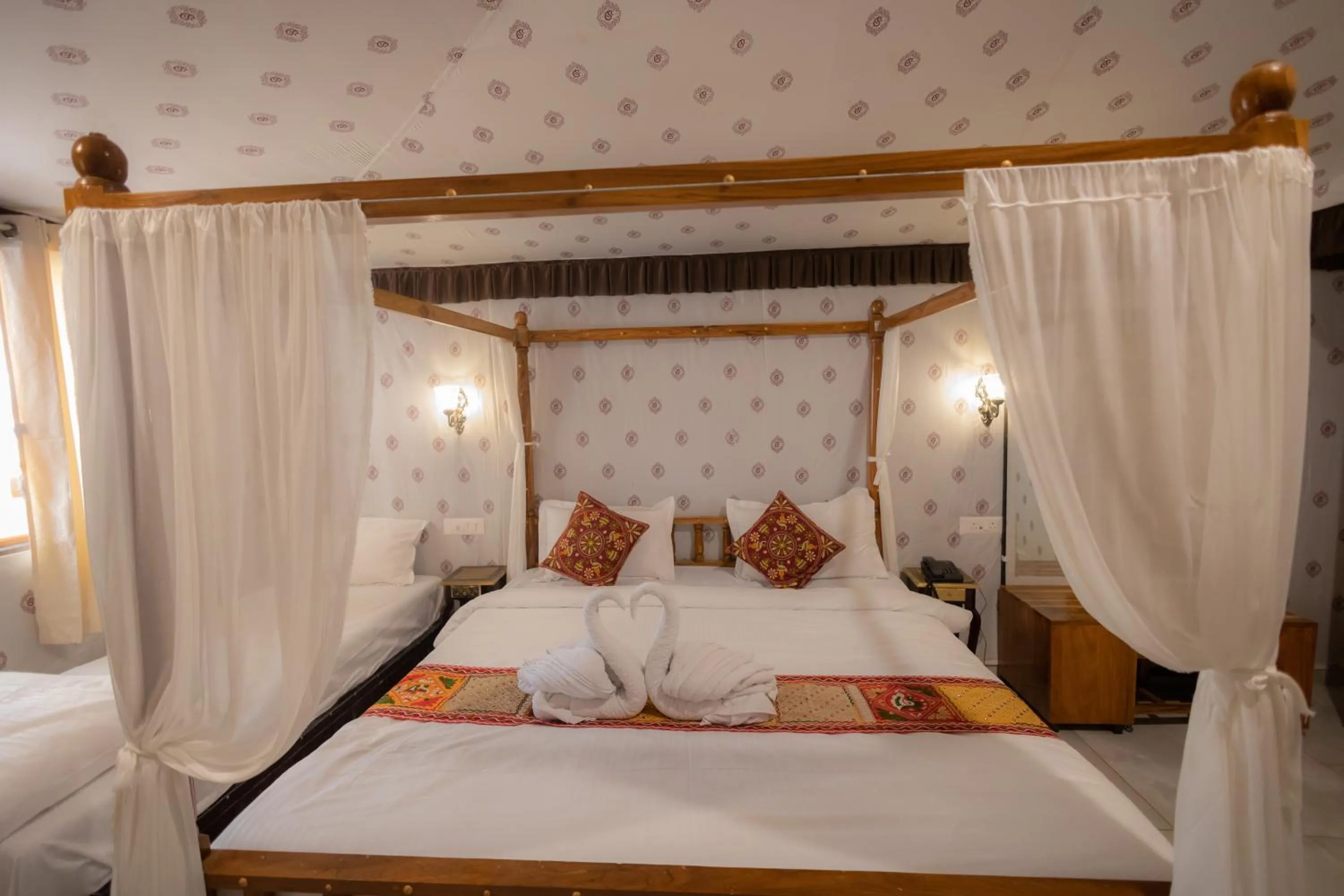 Bed in Vasant Vihar Resort