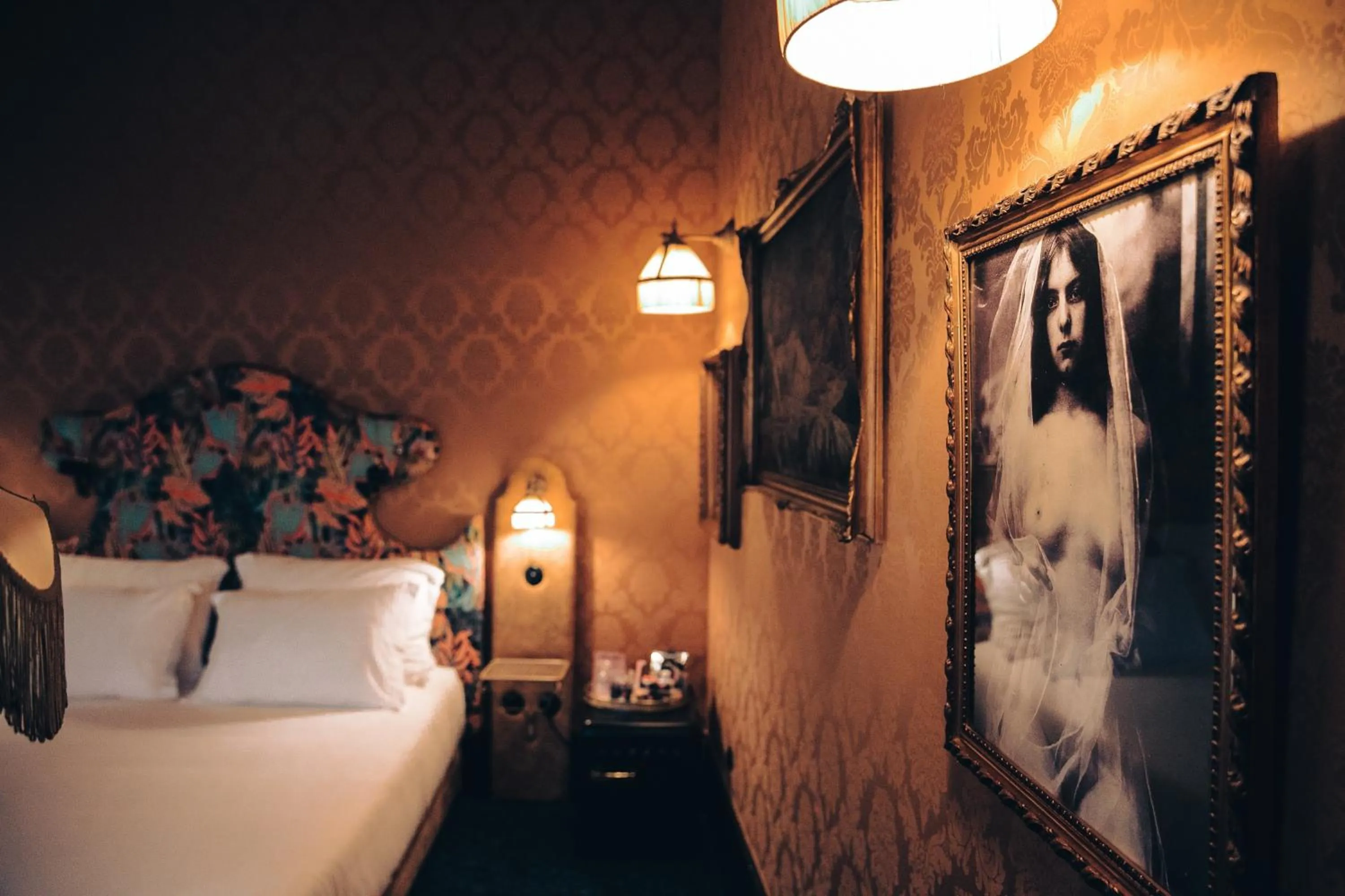 Bed in Pensão Amor Madam's Lodge