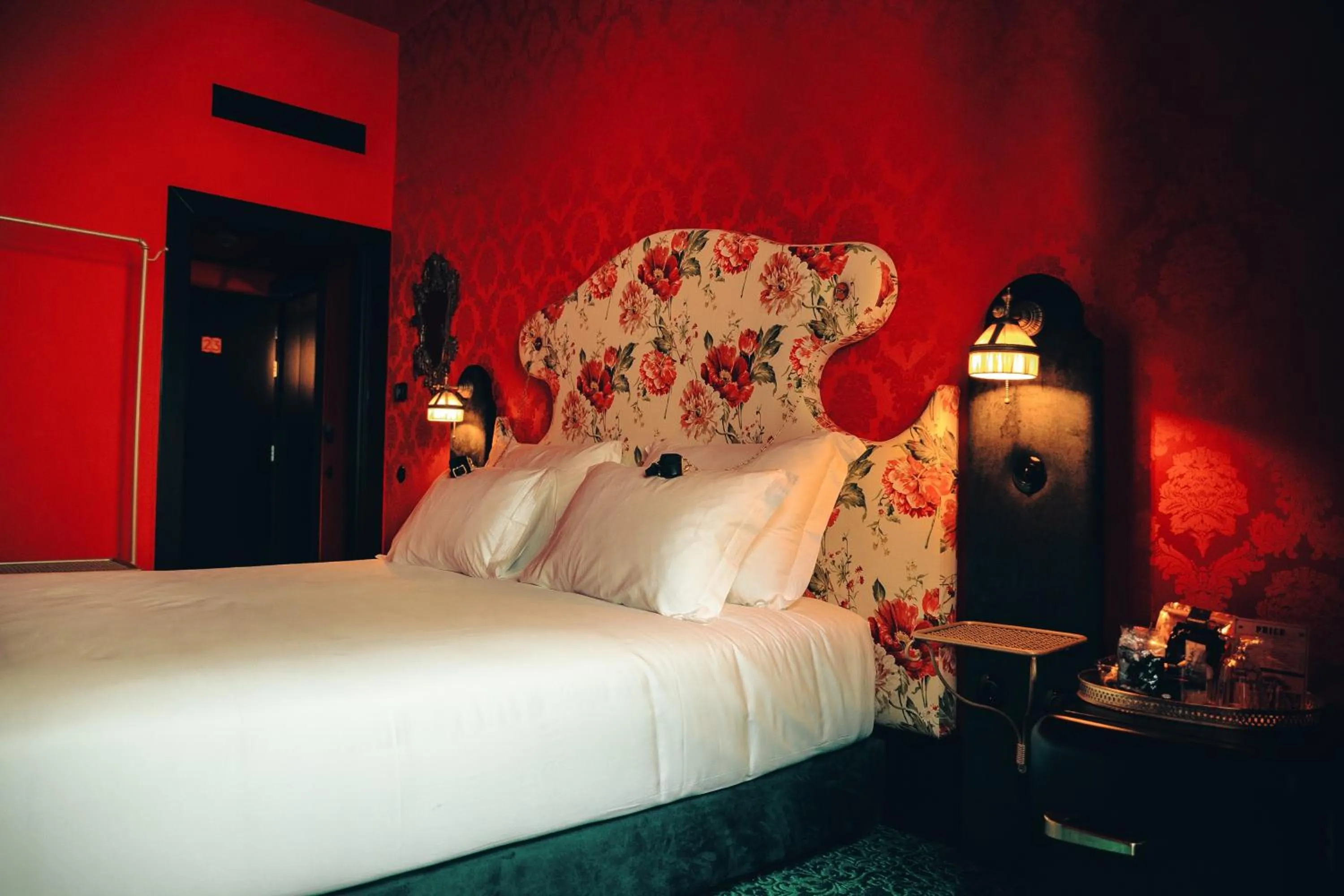 Bed in Pensão Amor Madam's Lodge