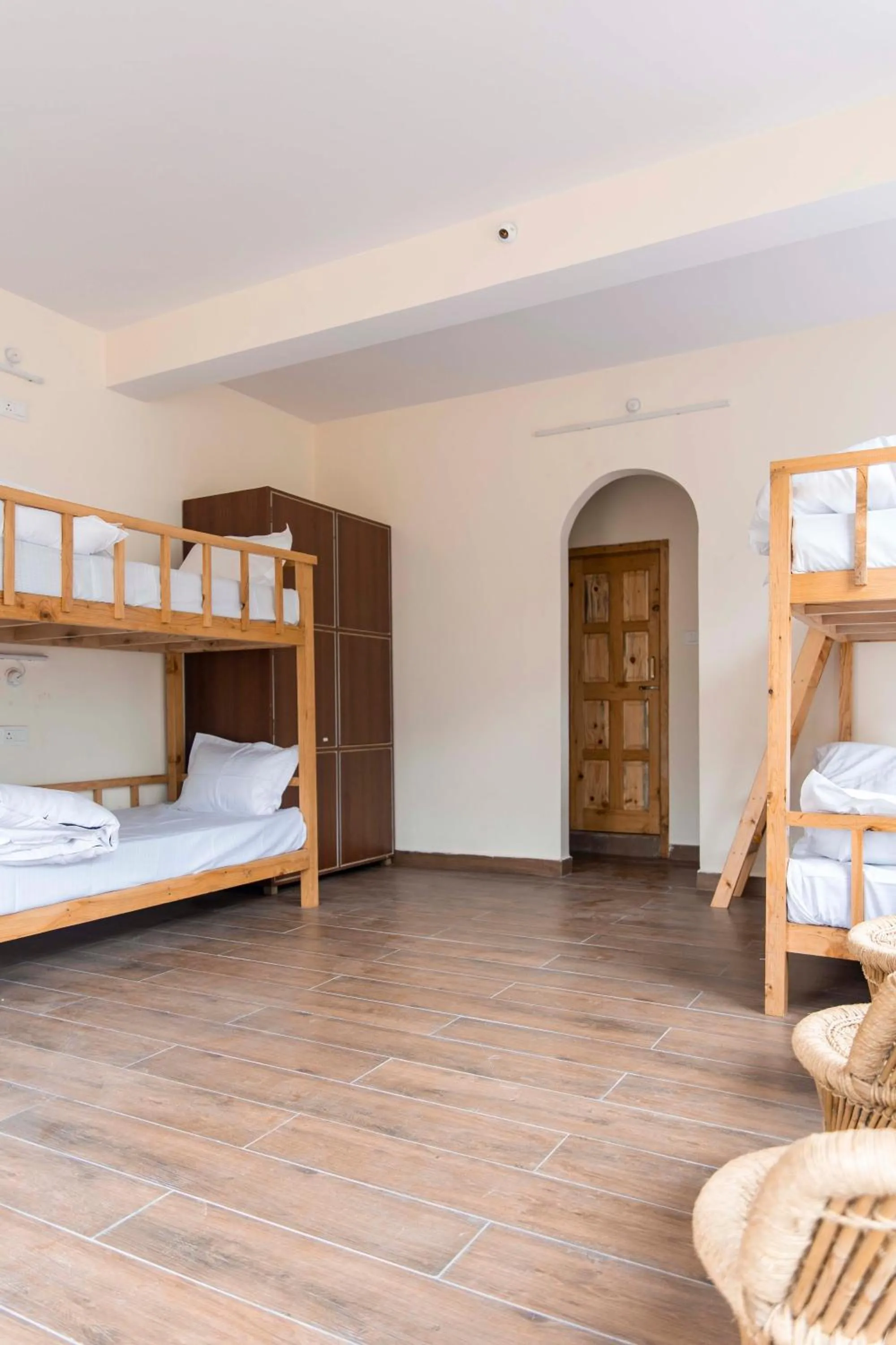 Bed in The Kamru Riverside Camps and Resorts