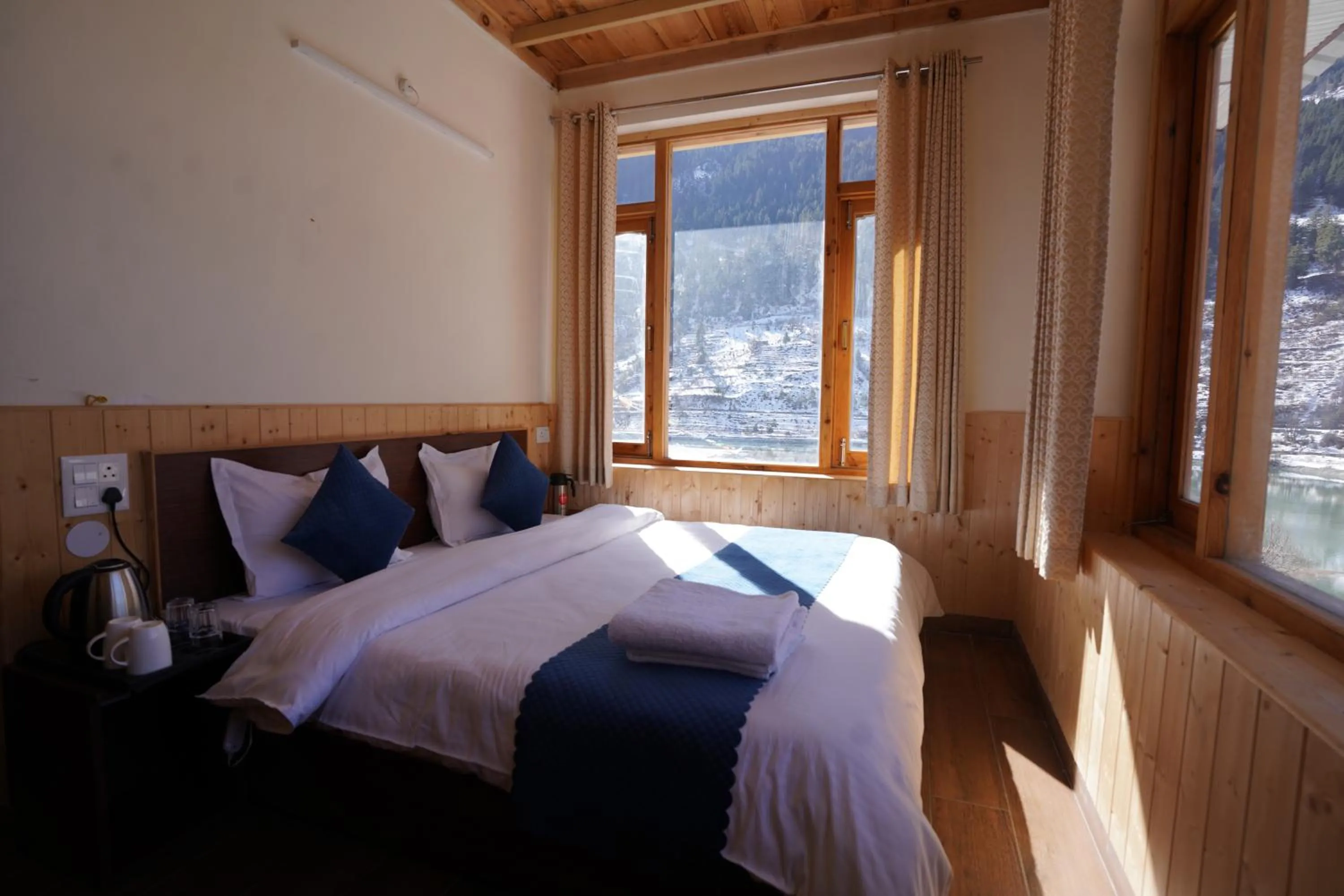 Photo of the whole room, Bed in The Kamru Riverside Camps and Resorts